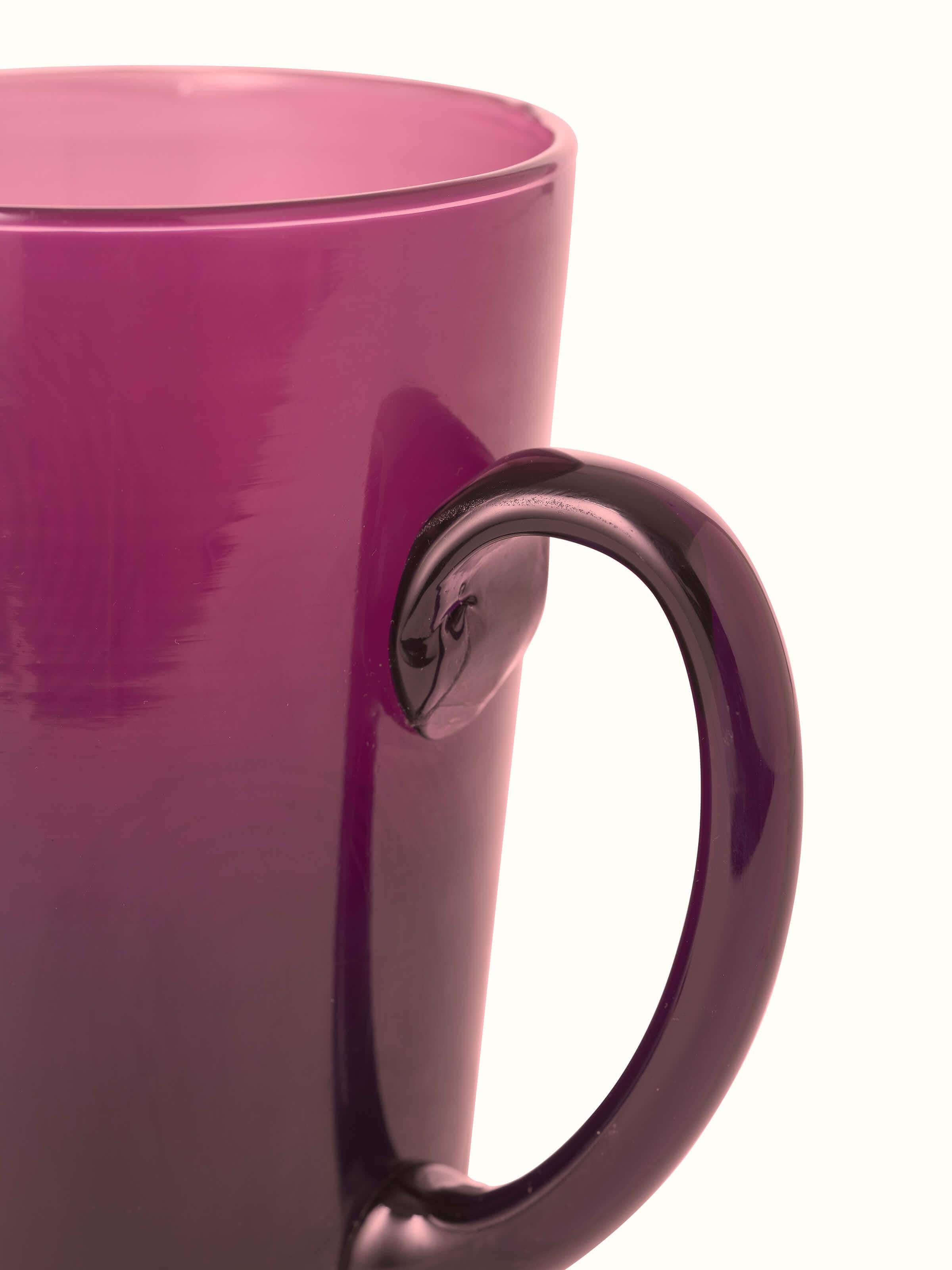 Detailed view of Firozabadi glass pitcher in purple showcasing its craftsmanship and finish.
