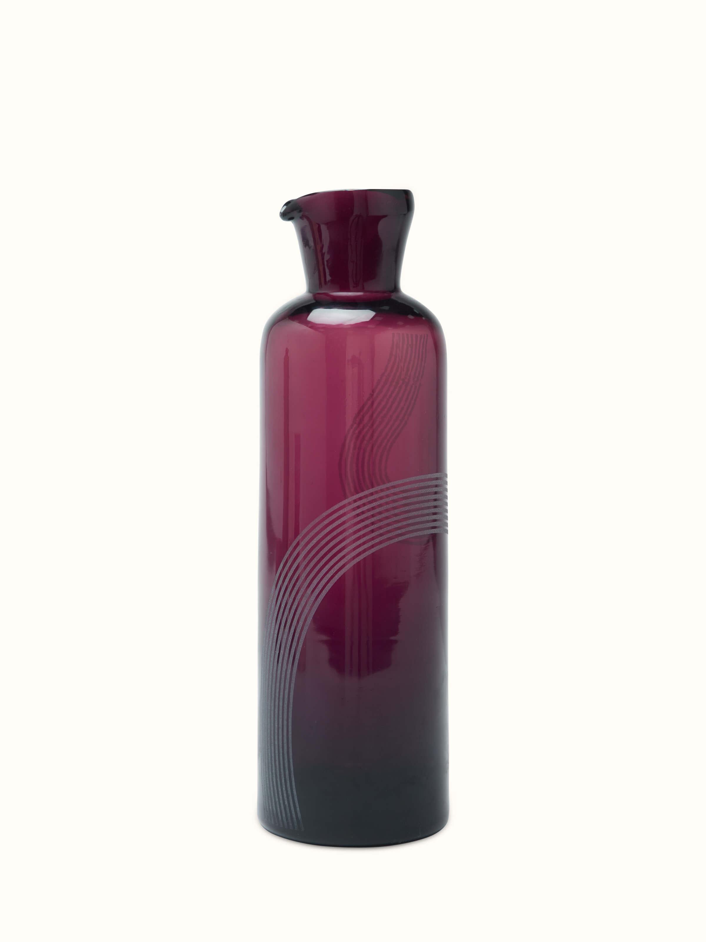 Top view of Firozabadi glass carafe in purple showcasing its elegant form and finish