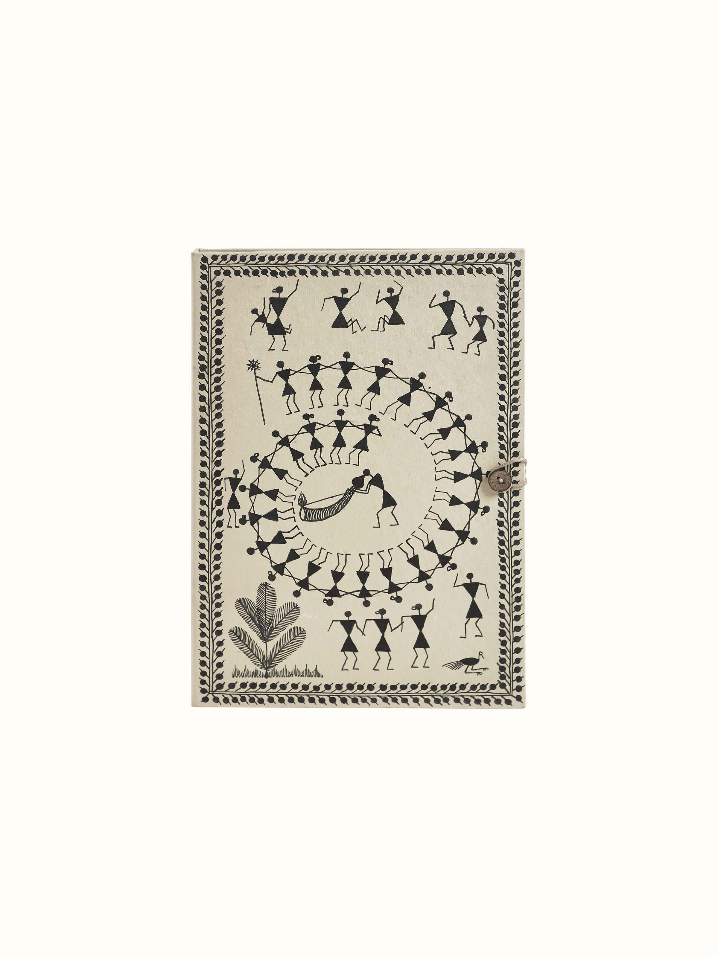 Front view of Warli painted paper file folder in brown, featuring traditional Warli art designs
