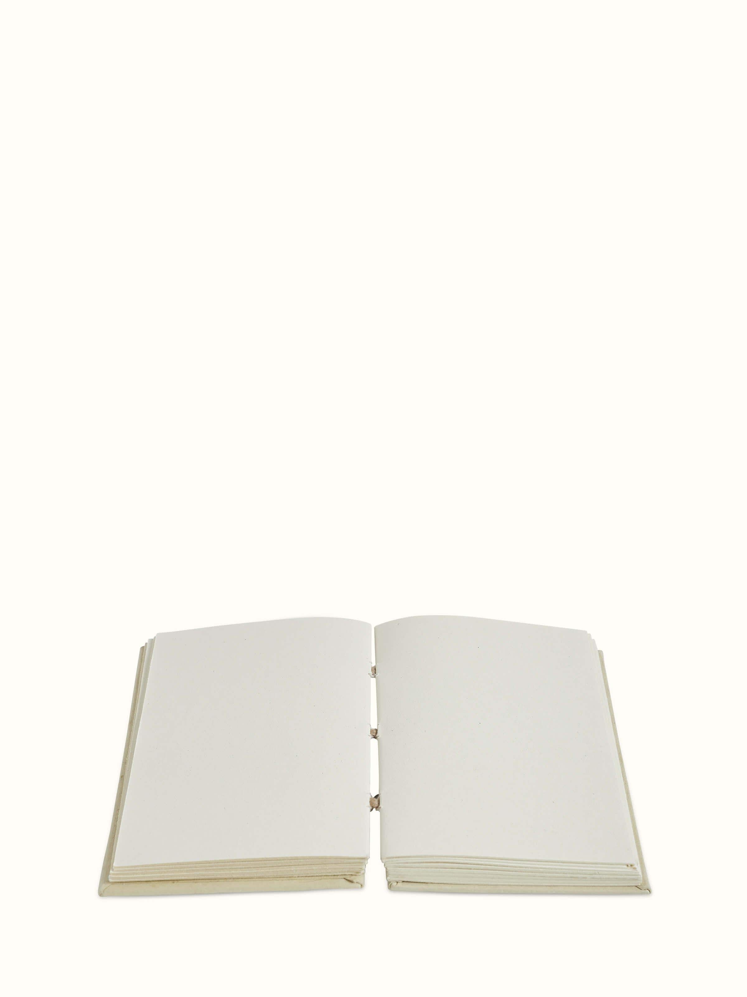 Detailed view of Warli painted paper planner brown emphasizing its unique artwork and design