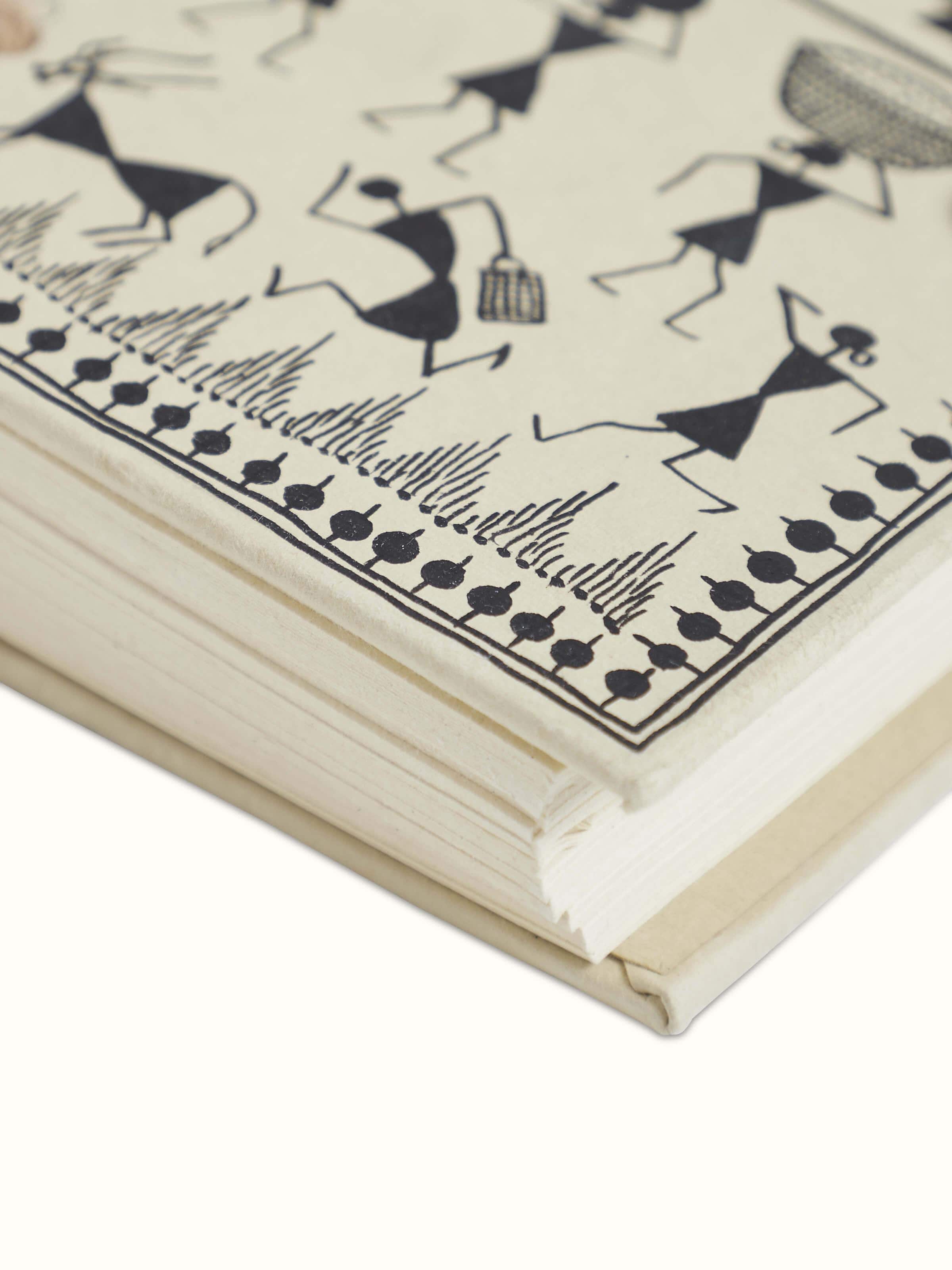 Top view of Warli painted paper planner brown showcasing its artistic cover design and texture