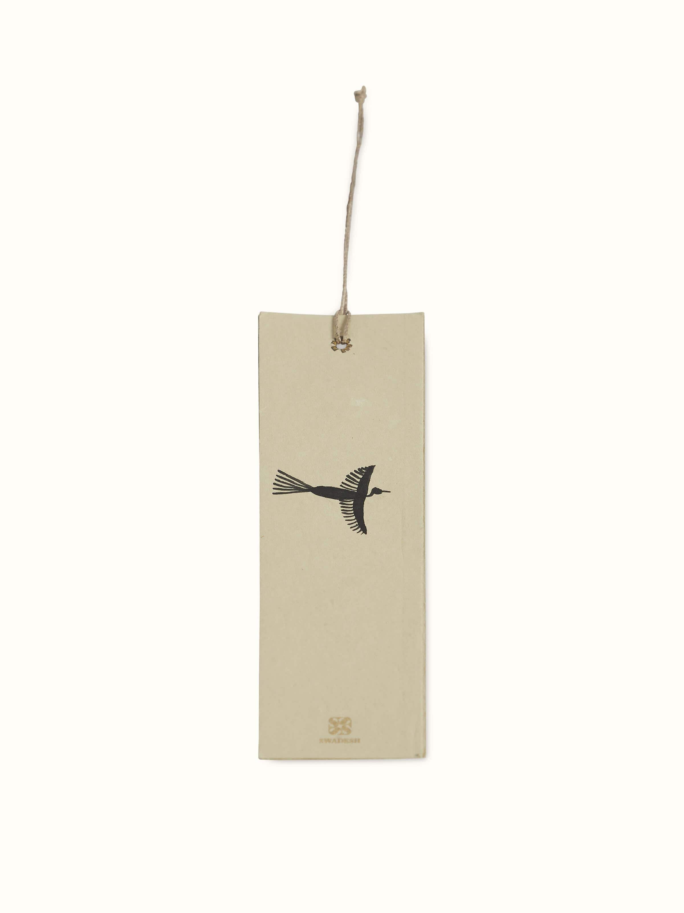 Detailed shot of Warli painted paper bookmarks in brown (2 pcs) showing close-up of the Warli art patterns.