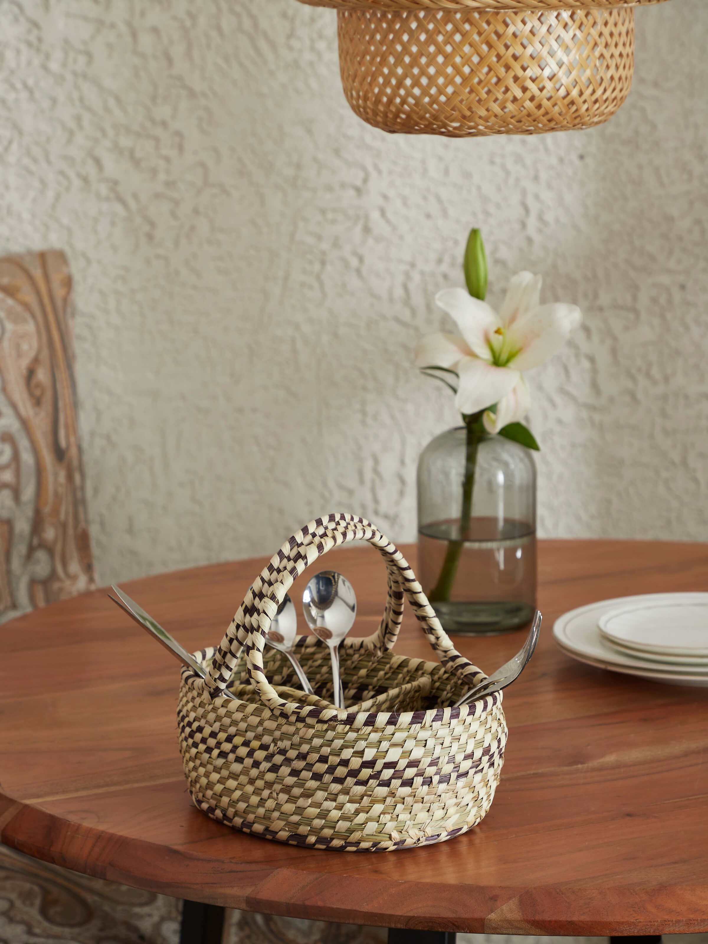 Side view of Kanshi basketry natural fibre cutlery holder showcasing the weave pattern and natural materials