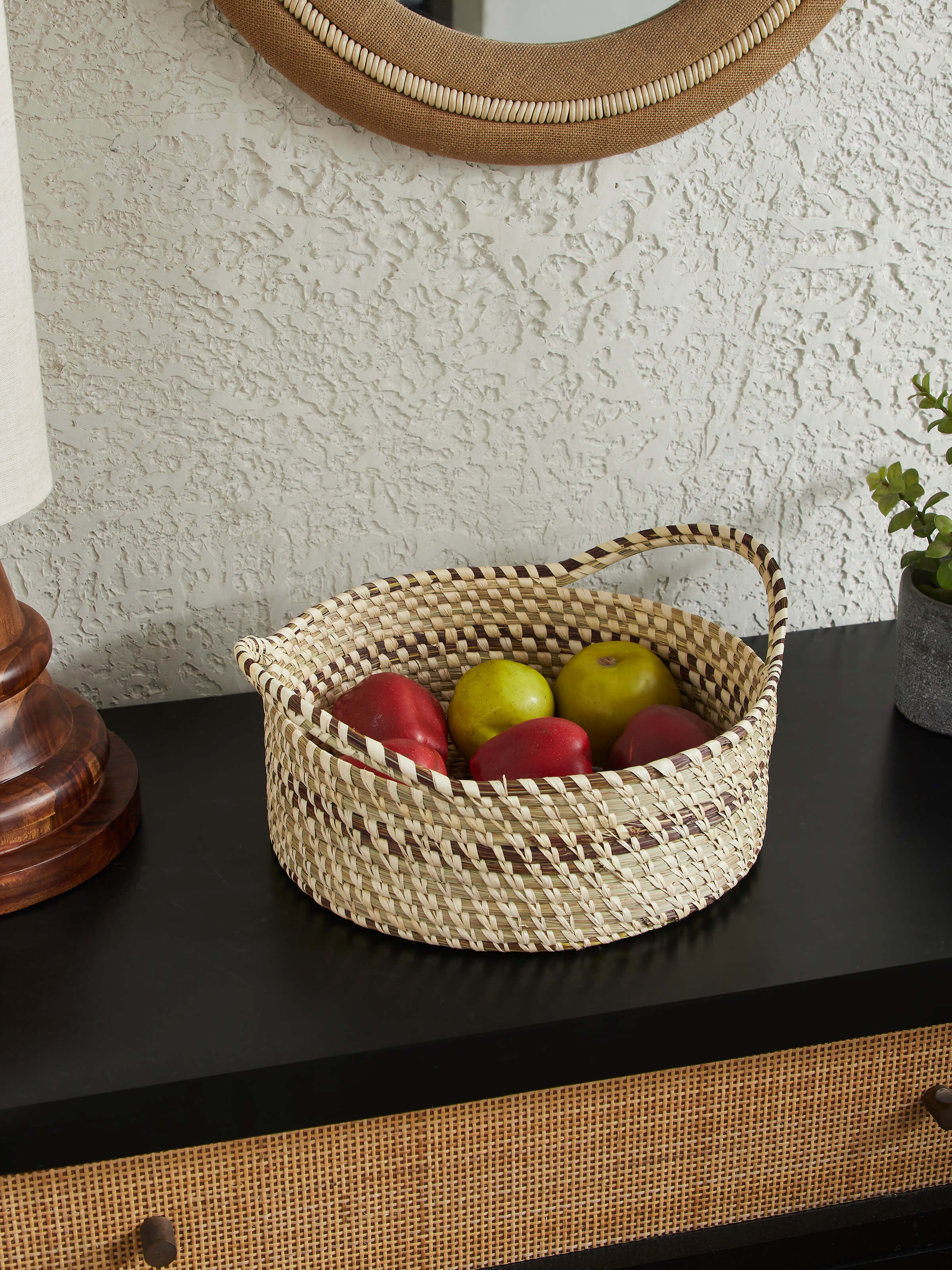 Close-up view of Kanshi basketry natural fibre fruit basket, showcasing its detailed weaving and natural texture.