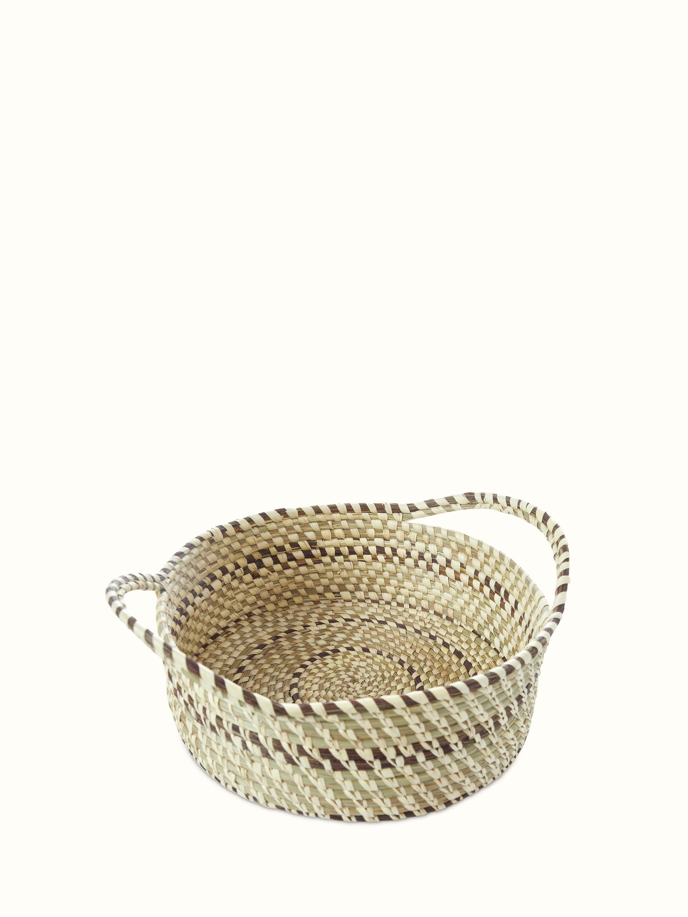 Side view of Kanshi basketry natural fibre fruit basket, highlighting its size and traditional craftsmanship.