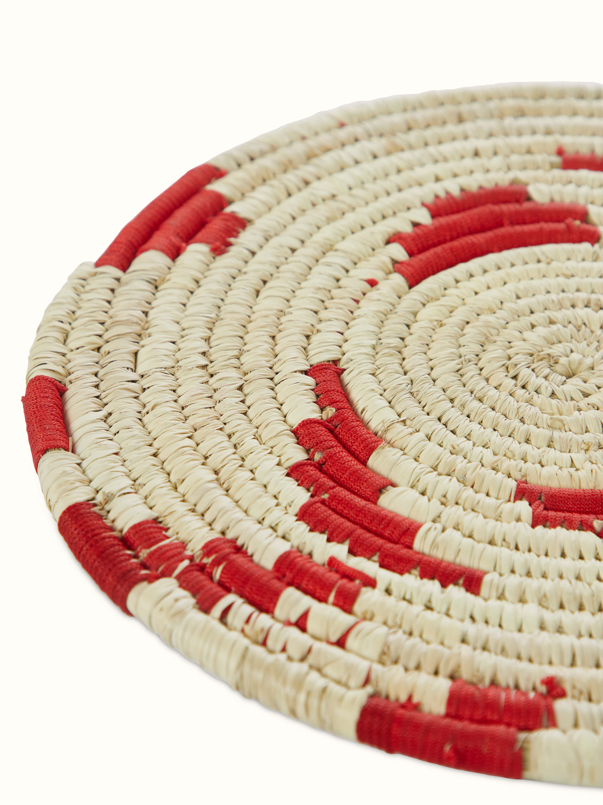 Alternate view of Kanshi Basketry Natural Fibre Trivets in red (2 pcs) showing different angles and the overall design.