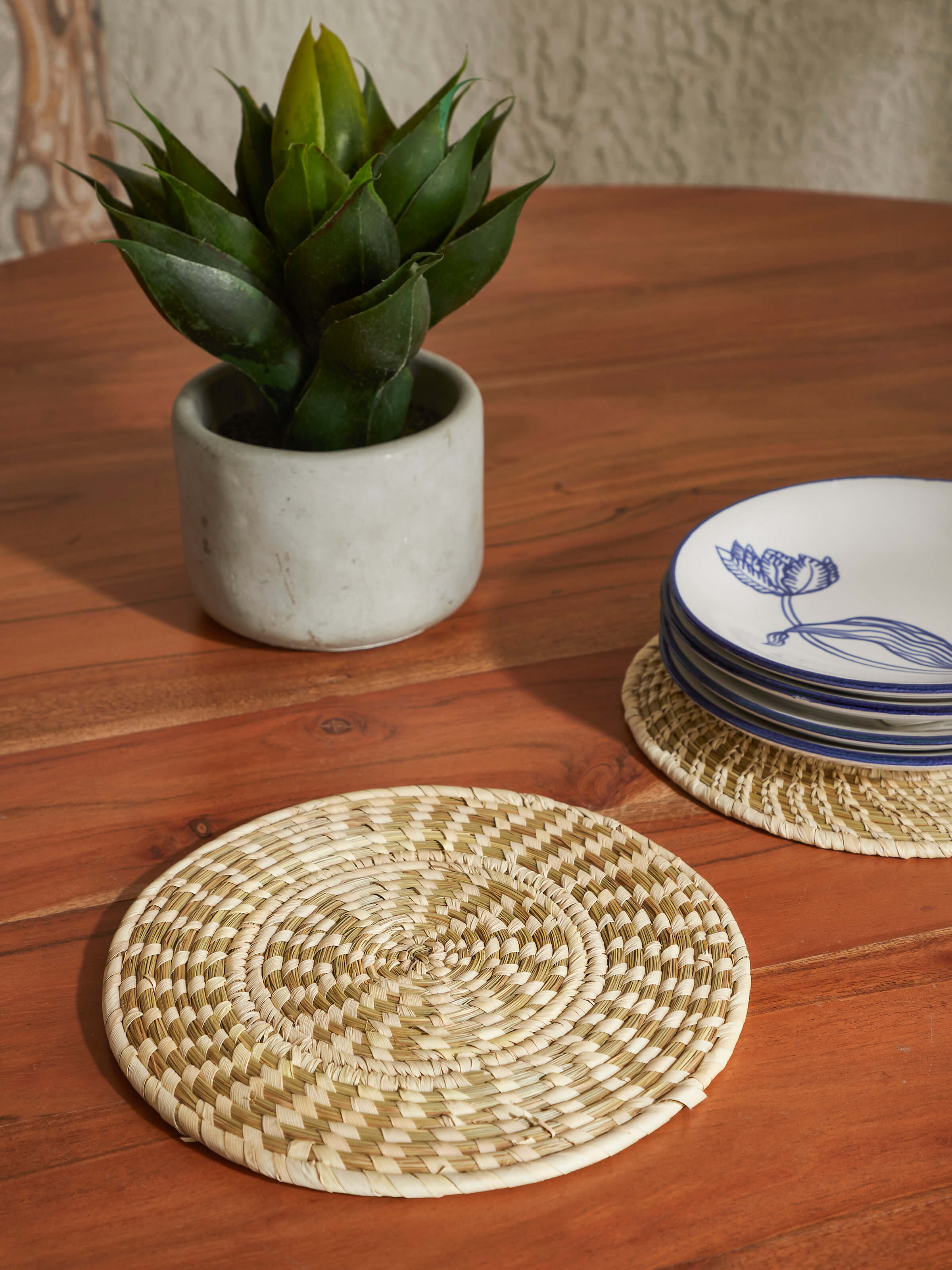 Front view of Kanshi basketry natural fibre trivets, highlighting their craftsmanship and design.
