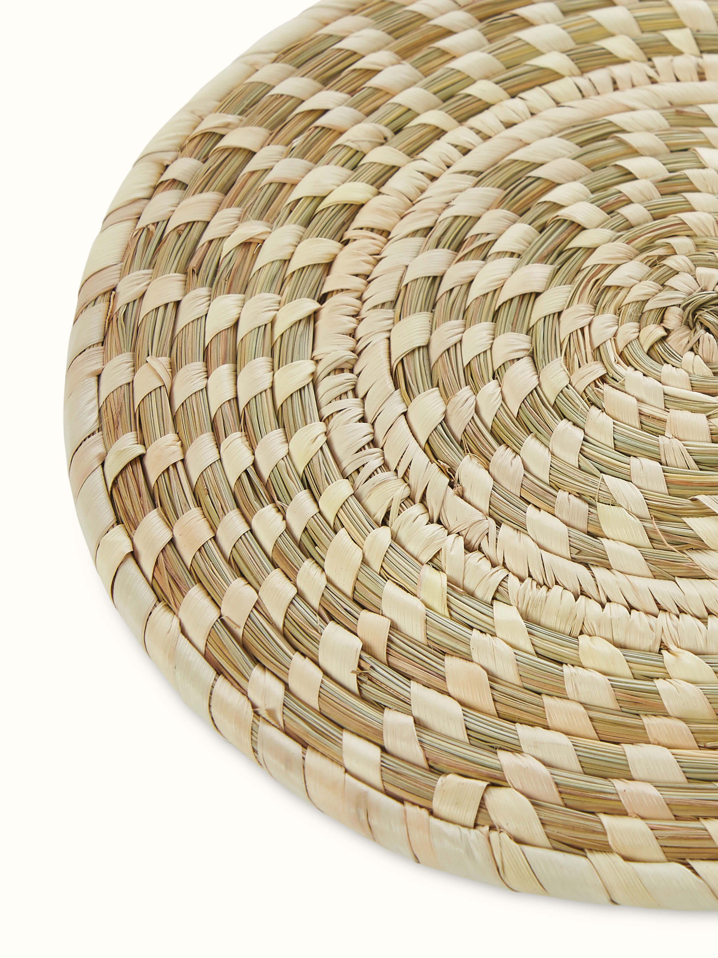 Close-up of Kanshi basketry natural fibre trivets, focusing on the weave pattern and durable material.
