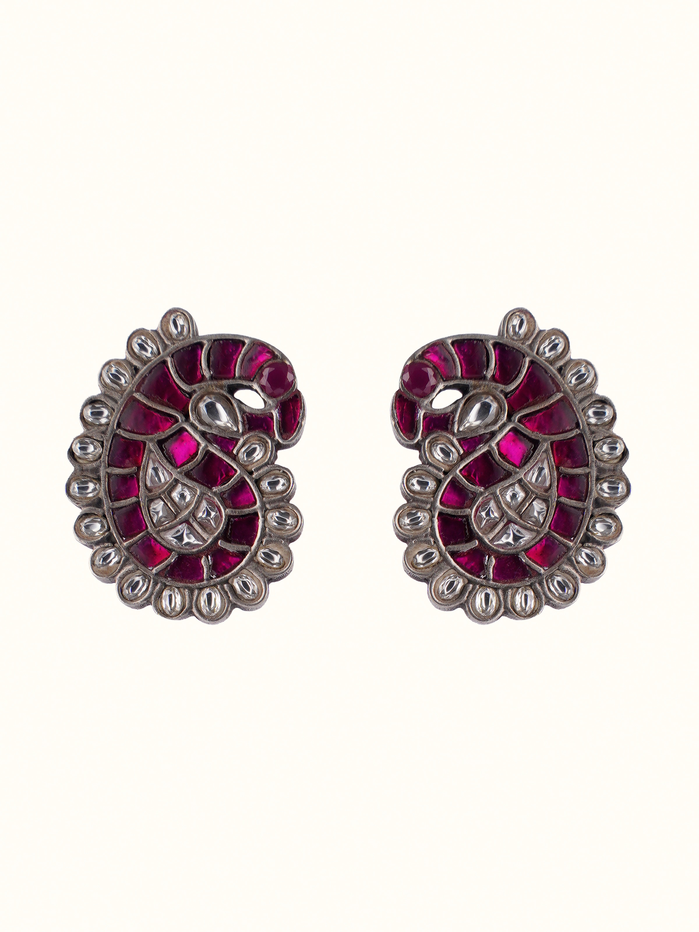 Front view of the handcrafted silver smithing studs with fine polish