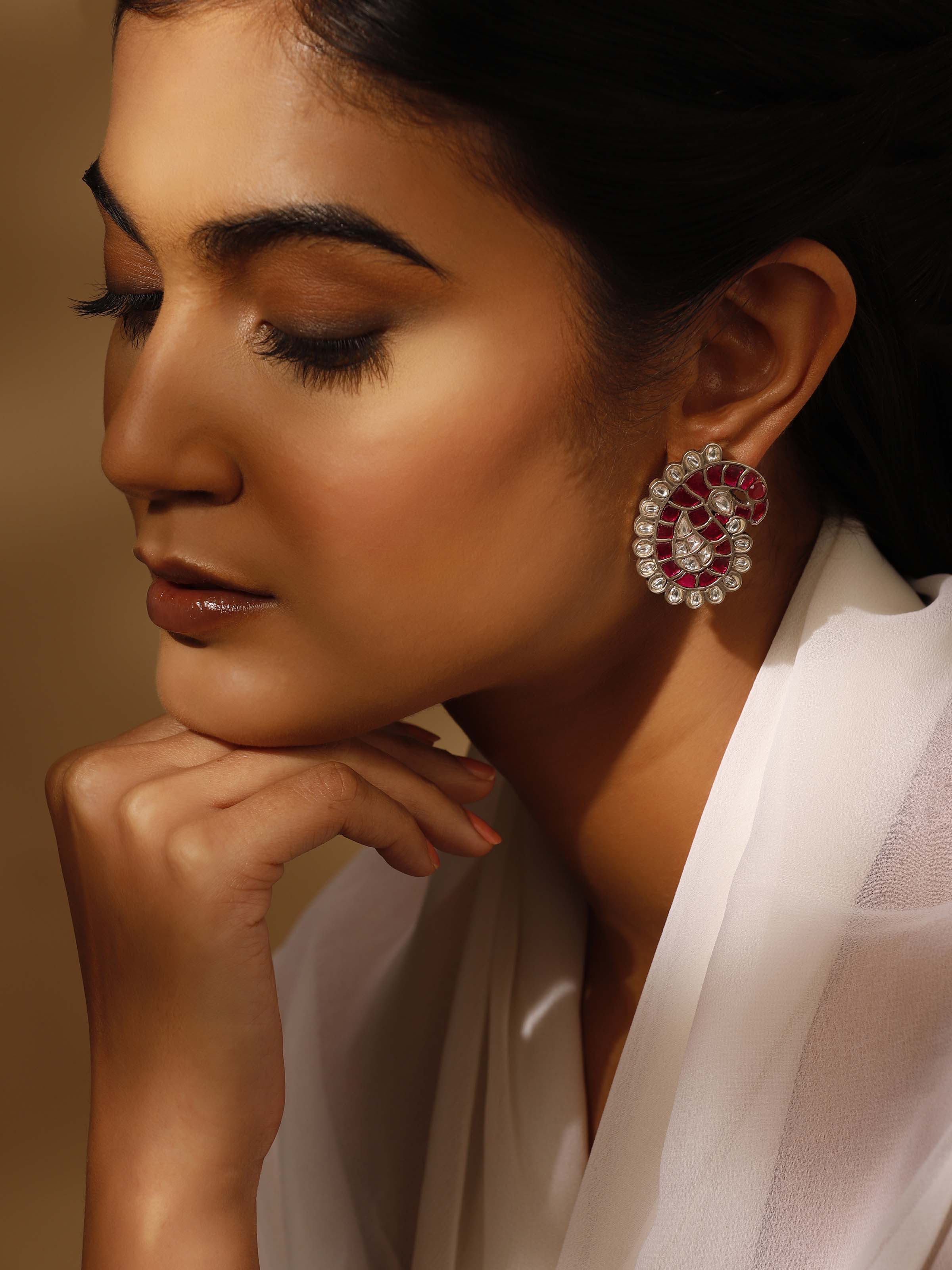 Alternate lifestyle angle showing the studs styled with formal wear