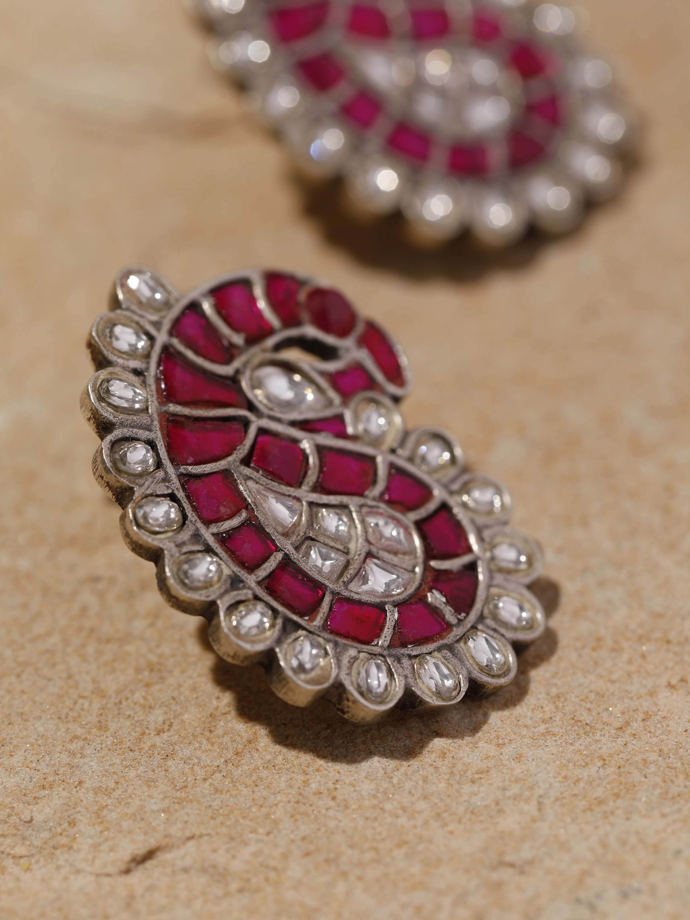 Close-up detailing the texture and smooth silver finishing