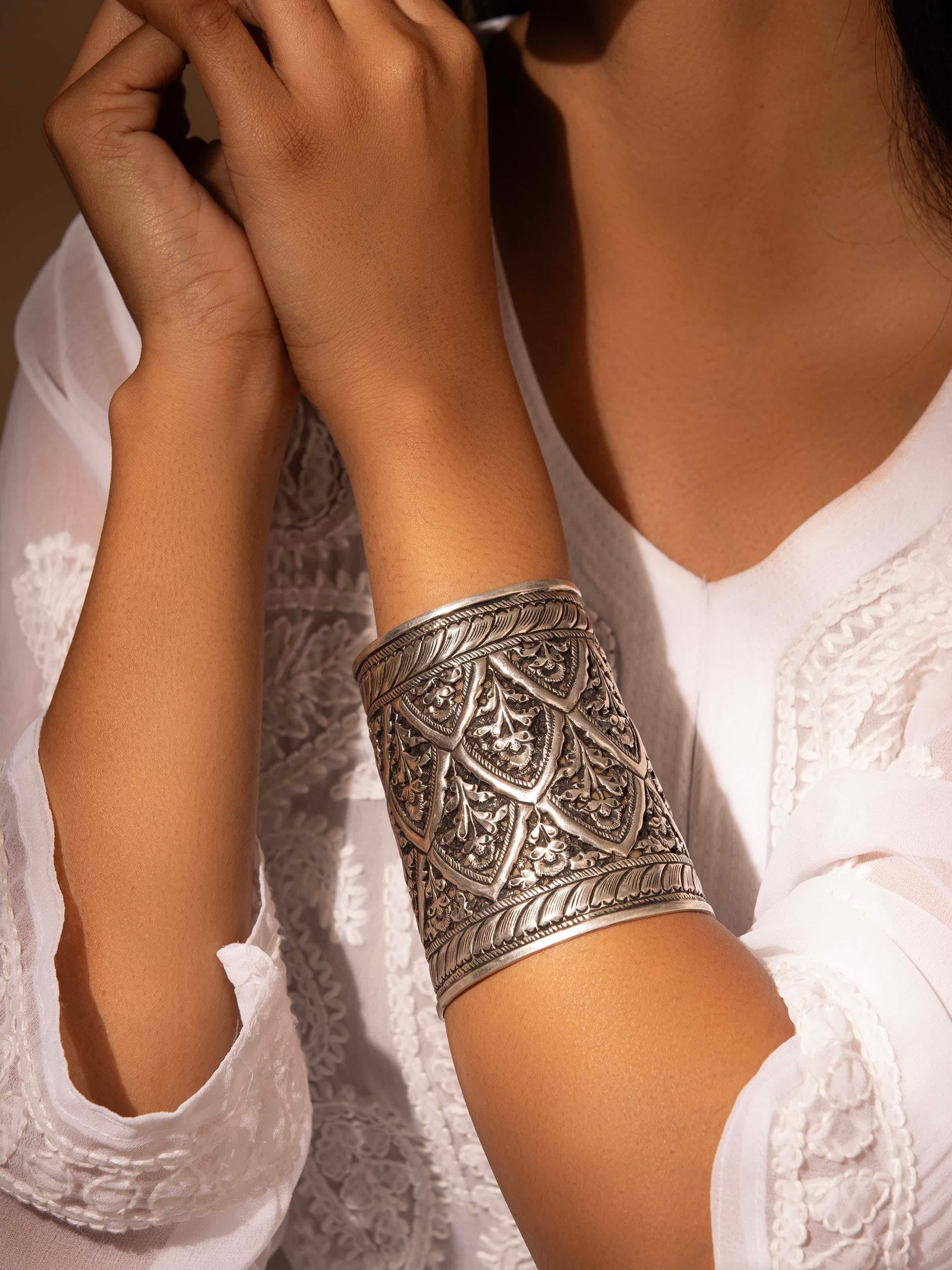 Close-up of Silver Smithing Hand Cuff highlighting refined craftsmanship and smooth silver finish.
