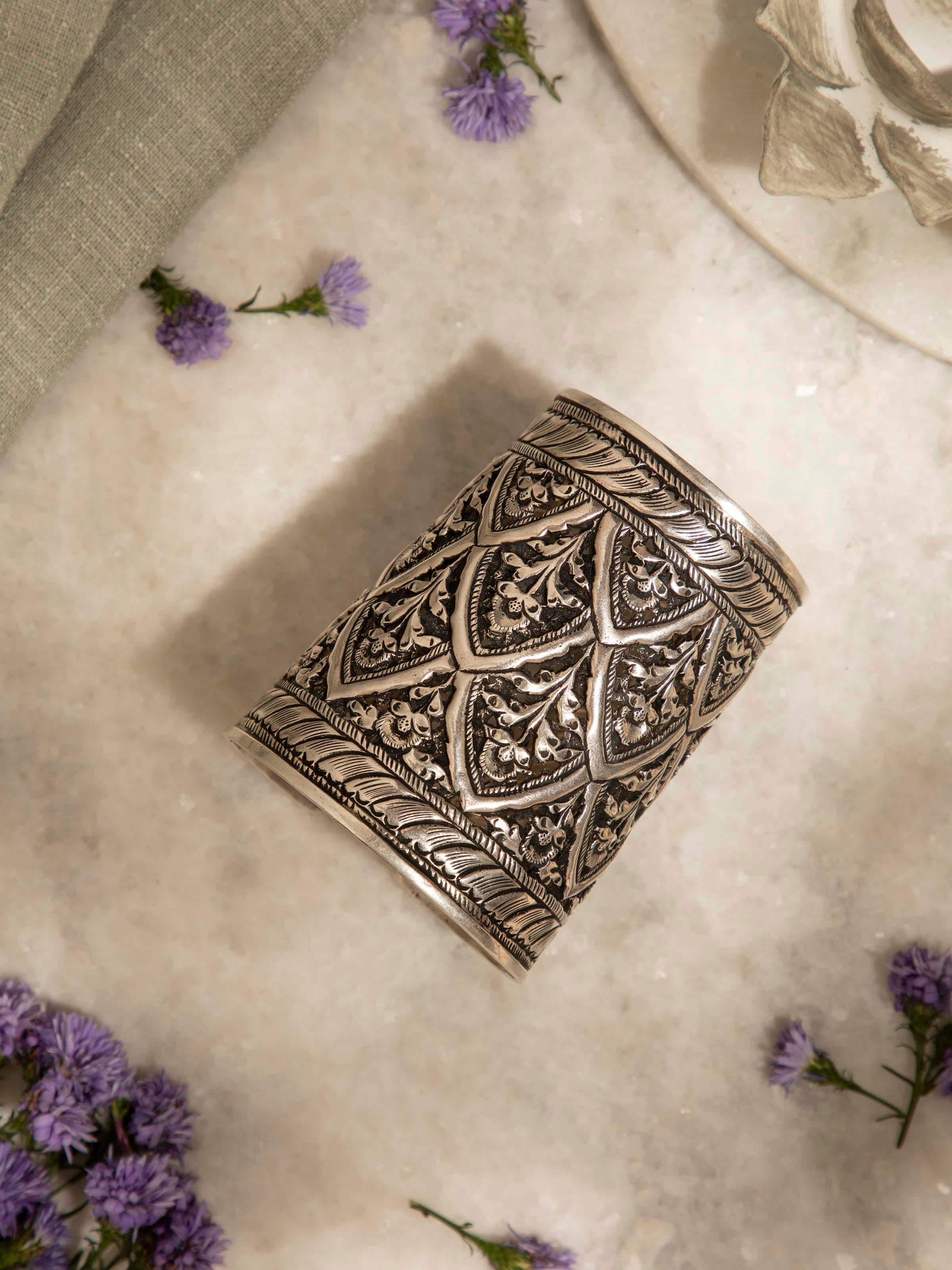 Artistic angle of Silver Smithing Hand Cuff showcasing its elegant design and detailed silverwork.