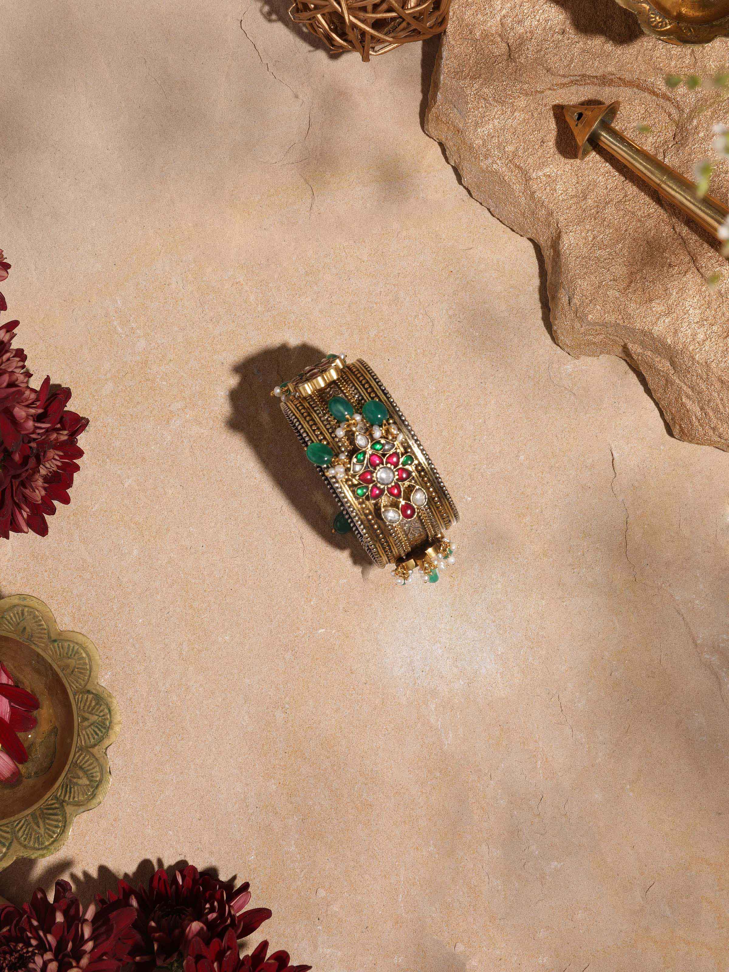 Detailed view of silver smithing bangle focusing on the fine craftsmanship and design details.