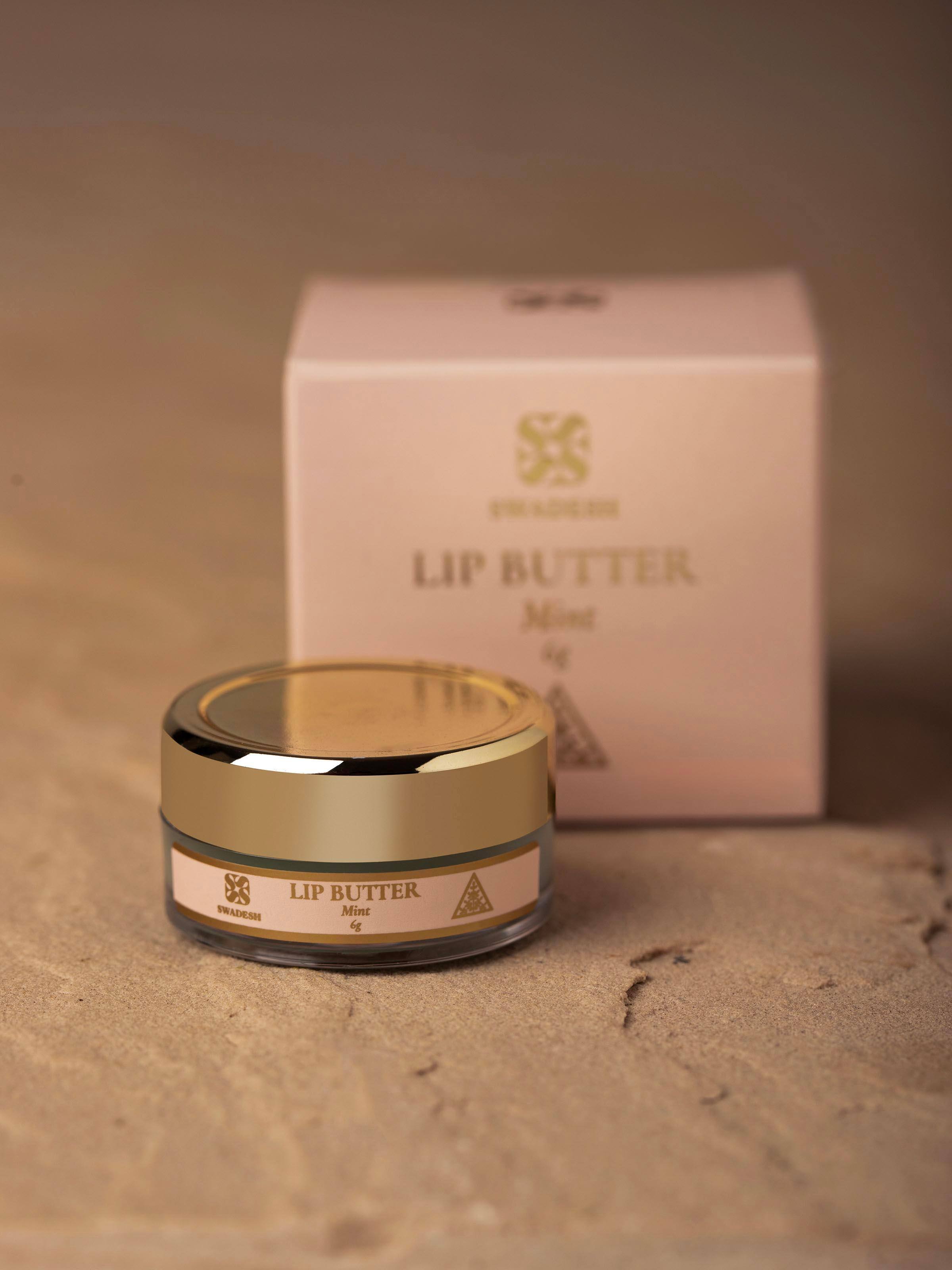 Side view of Lip Butter Mint emphasizing the twist-up applicator and product design