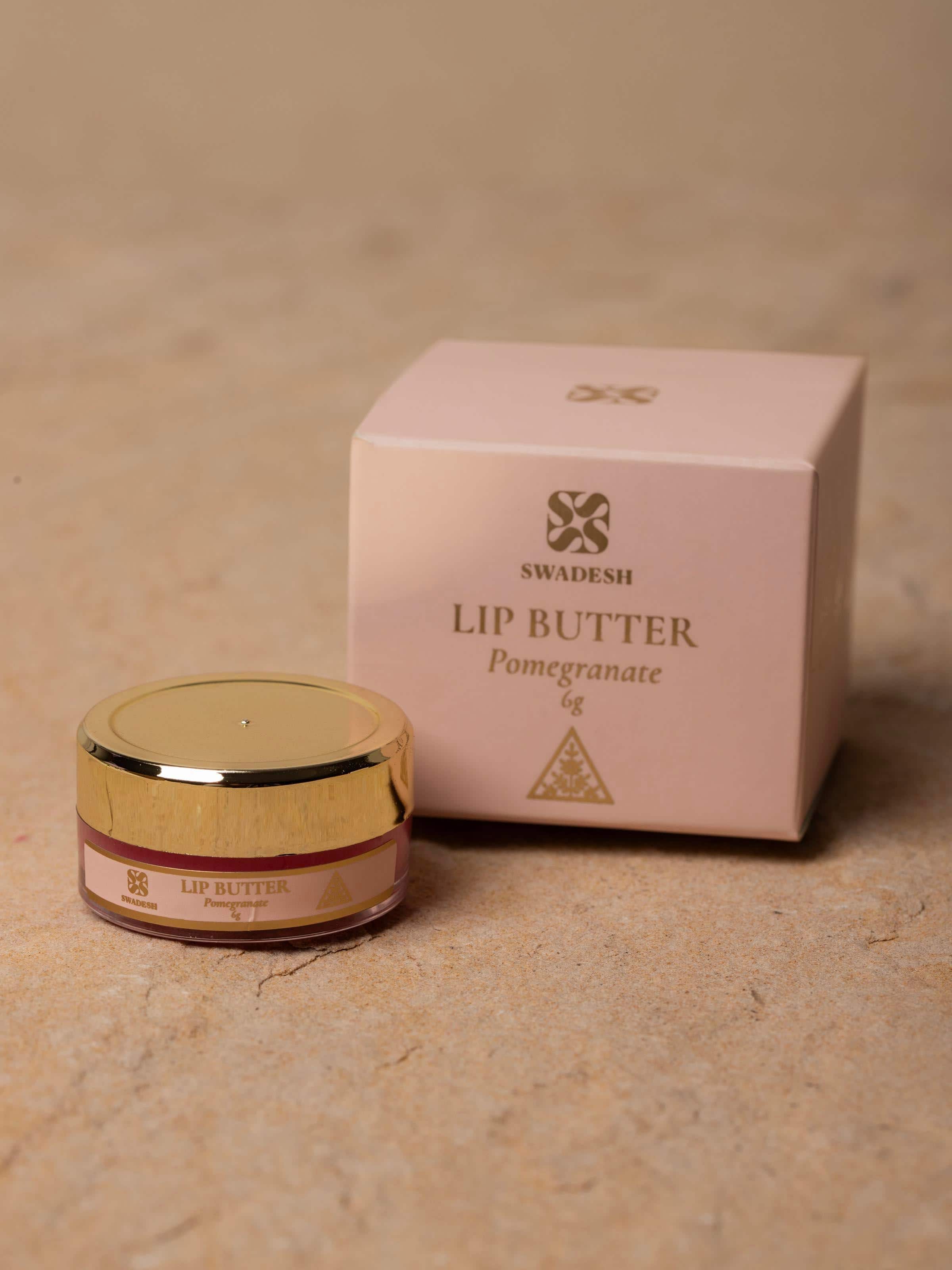 Side view of Lip Butter Pomegranate highlighting the jar's detailed label and smooth texture of the product.