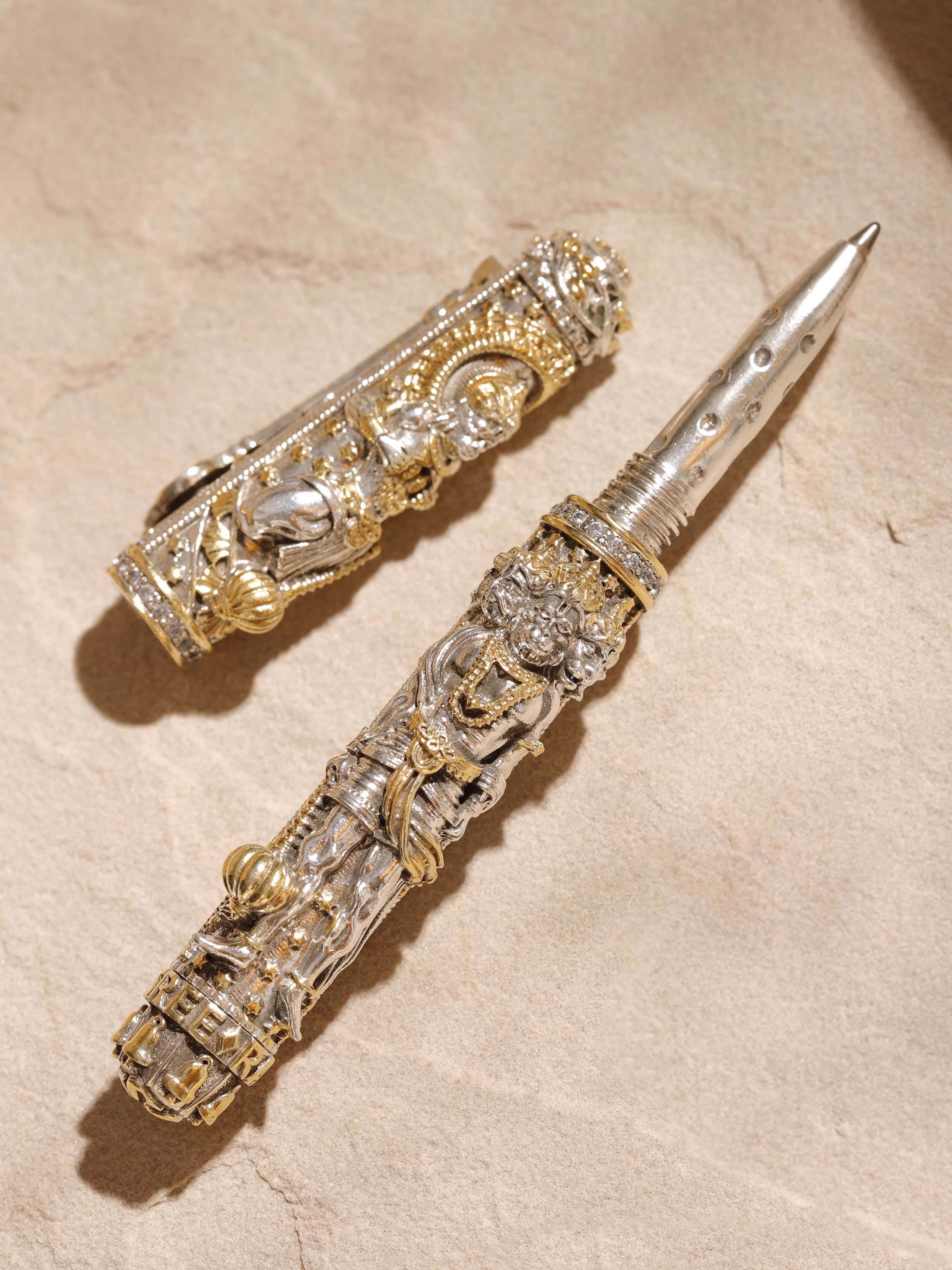 Detailed close-up of Lord Hanuman Silver Smithing Pen focusing on the fine engravings and silver finish.