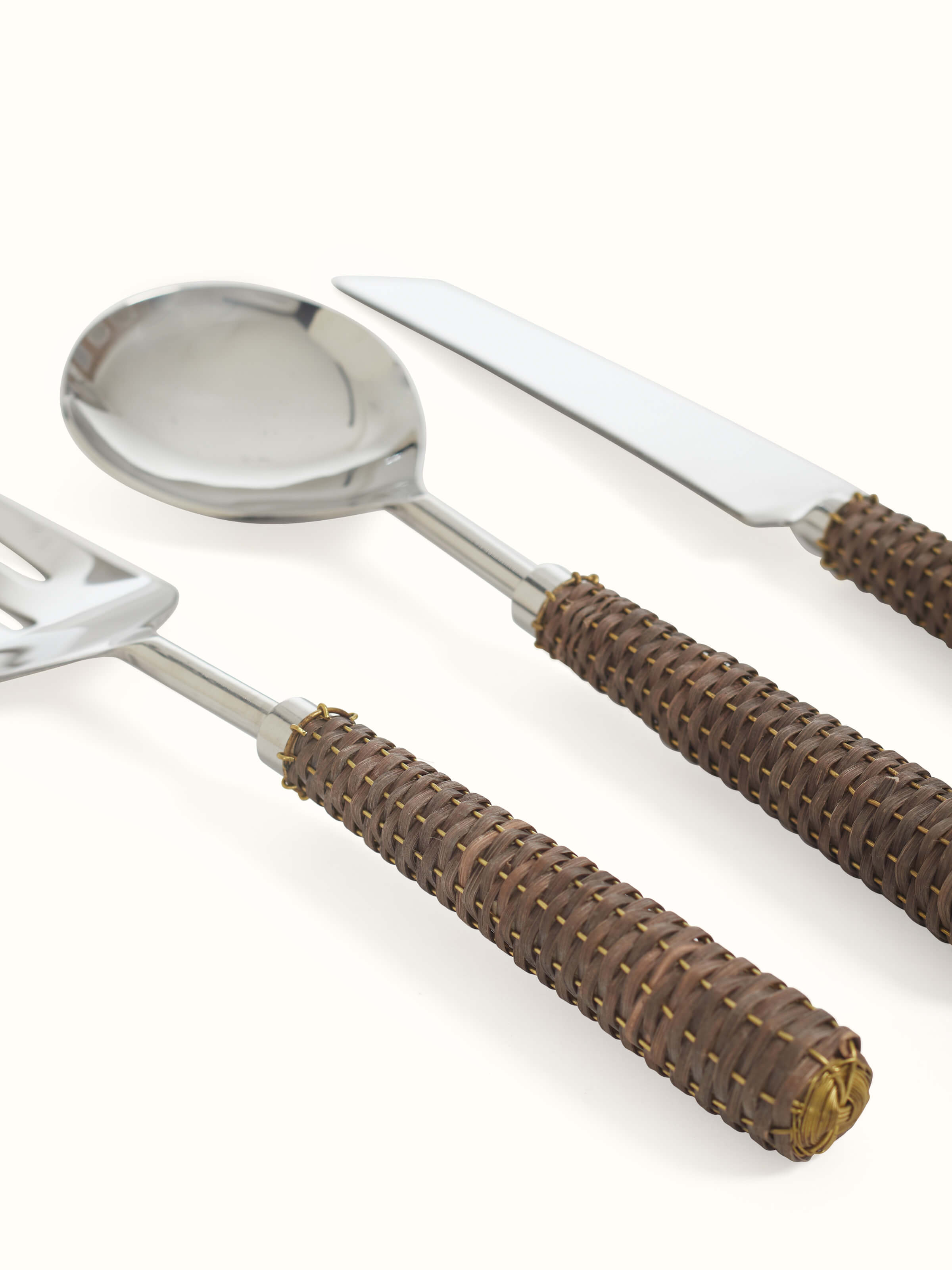 Detailed view of Rattan handle stainless steel cutlery set (3 pcs), highlighting the blend of materials.