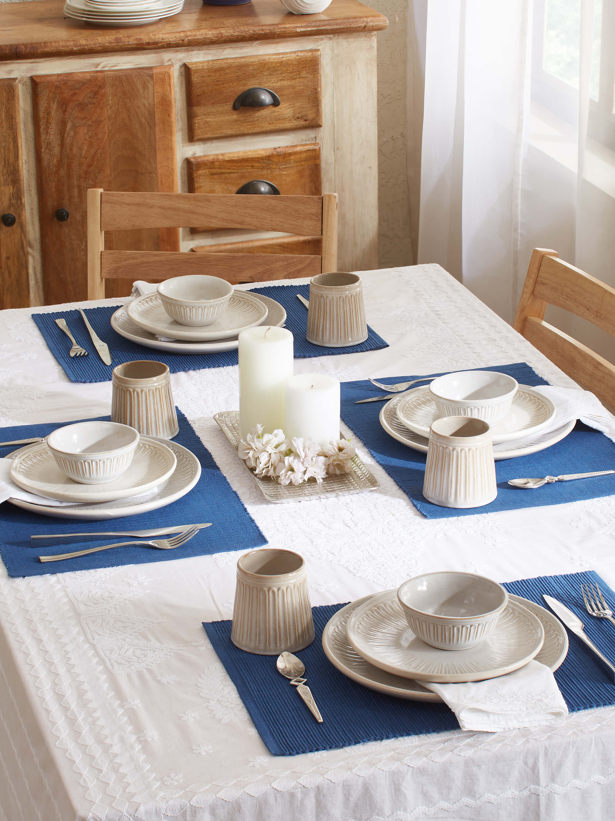 Side view of Studio Pottery Ceramic Dinner Plates in White, illustrating the depth and edge of the plates