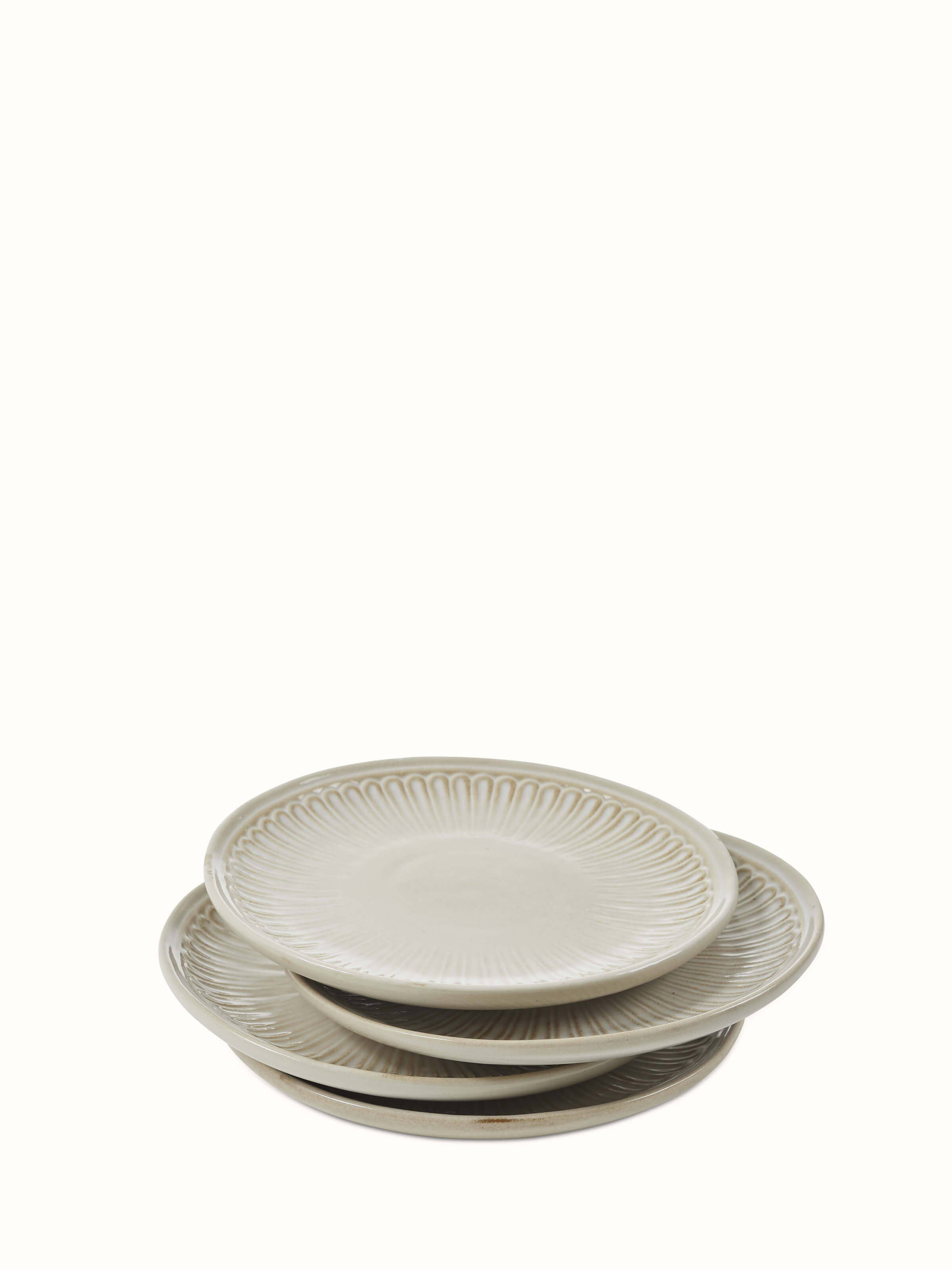 Front view of Studio pottery ceramic side plates (4 pcs) in white highlighting their clean, modern design
