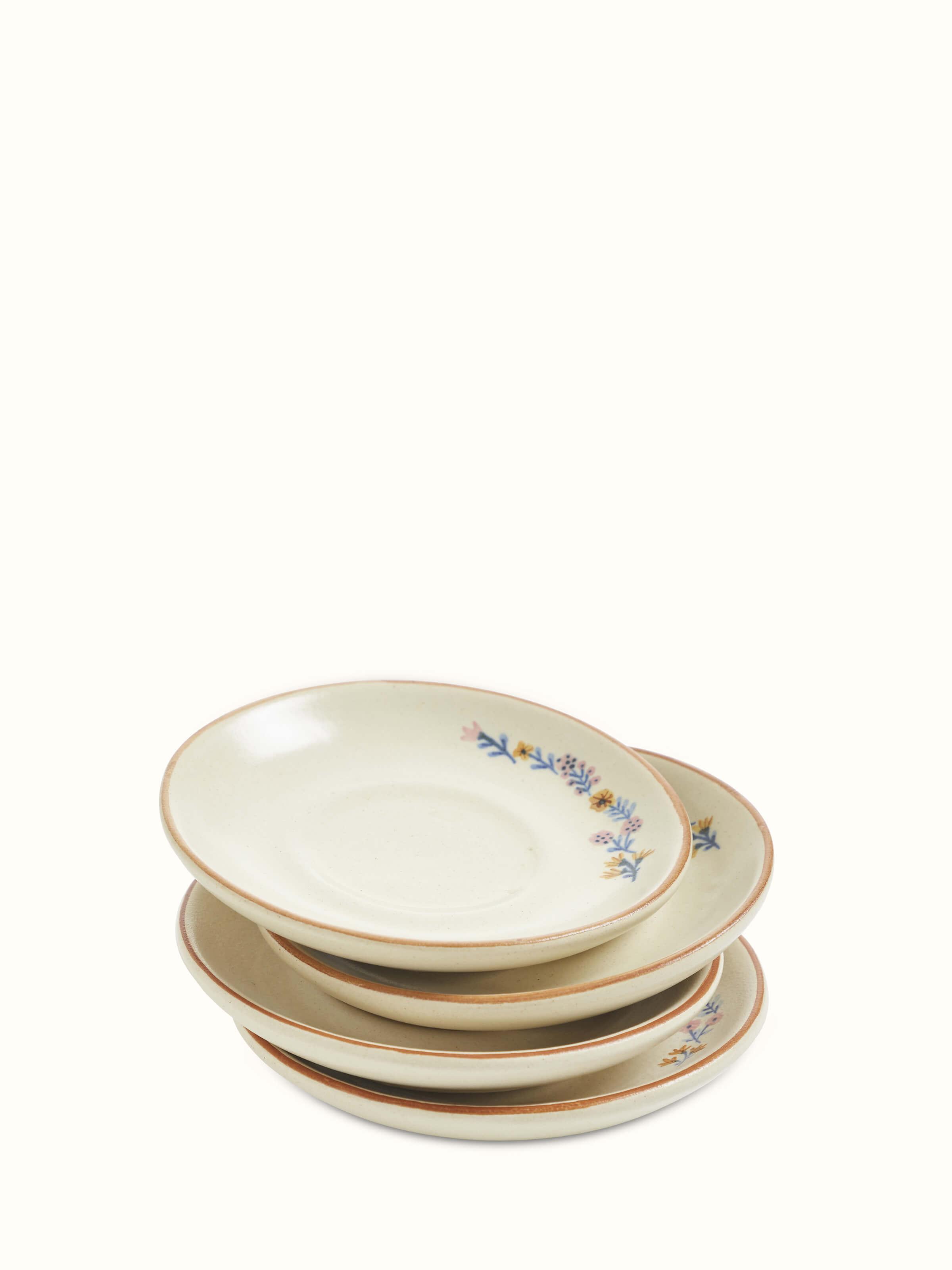 Angled view of studio pottery ceramic teacups set showcasing their elegant shape