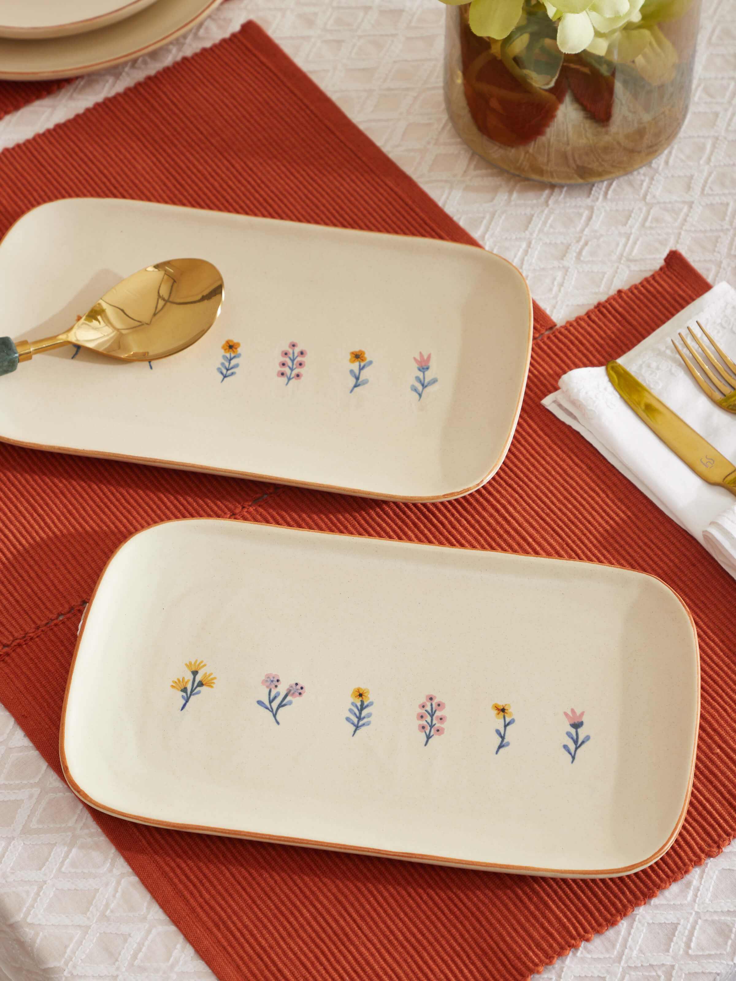 Side view of Studio pottery ceramic serving platters set showcasing intricate details