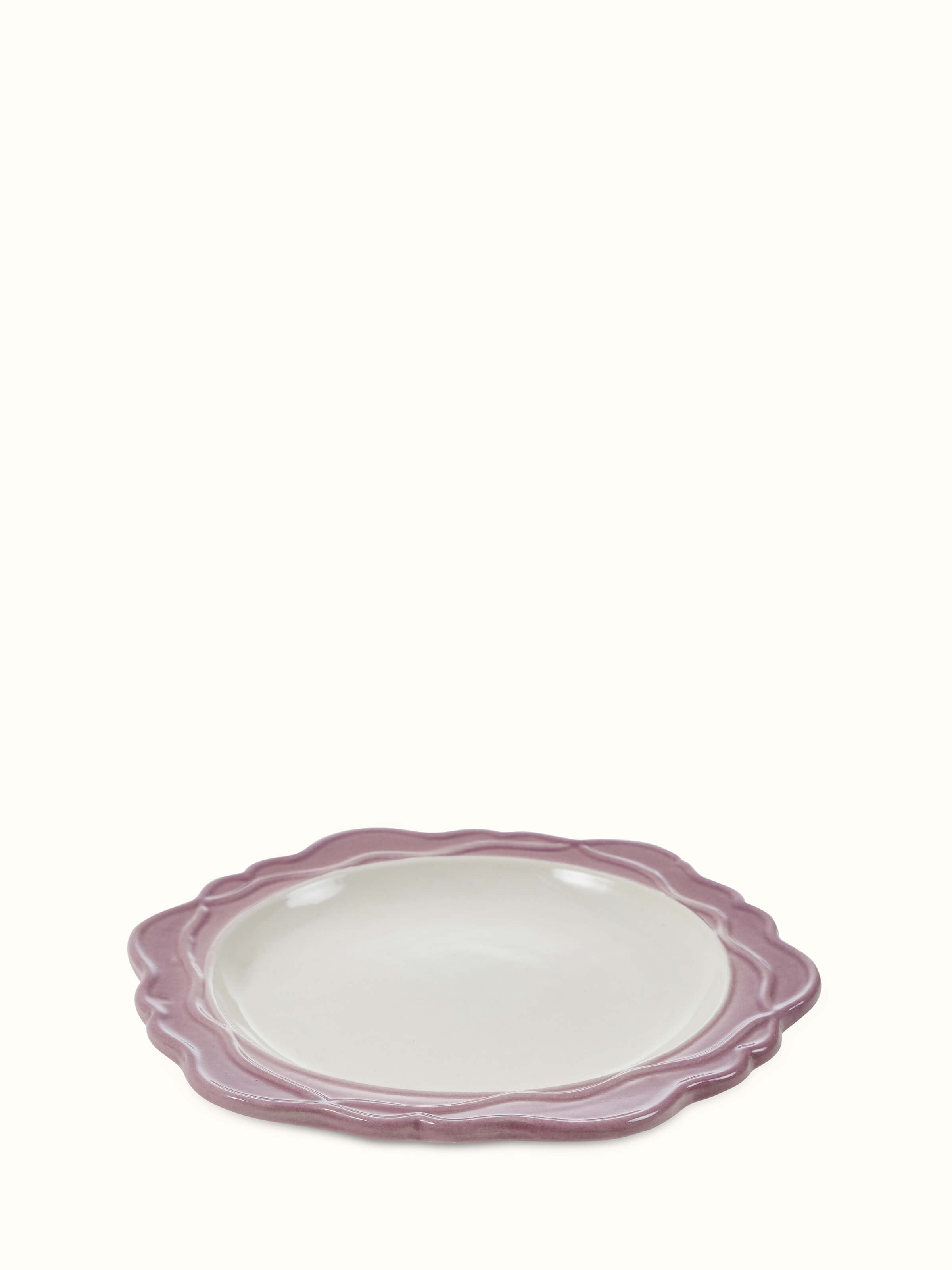 Angled view of studio pottery ceramic side plates white & pink set (4 pcs)