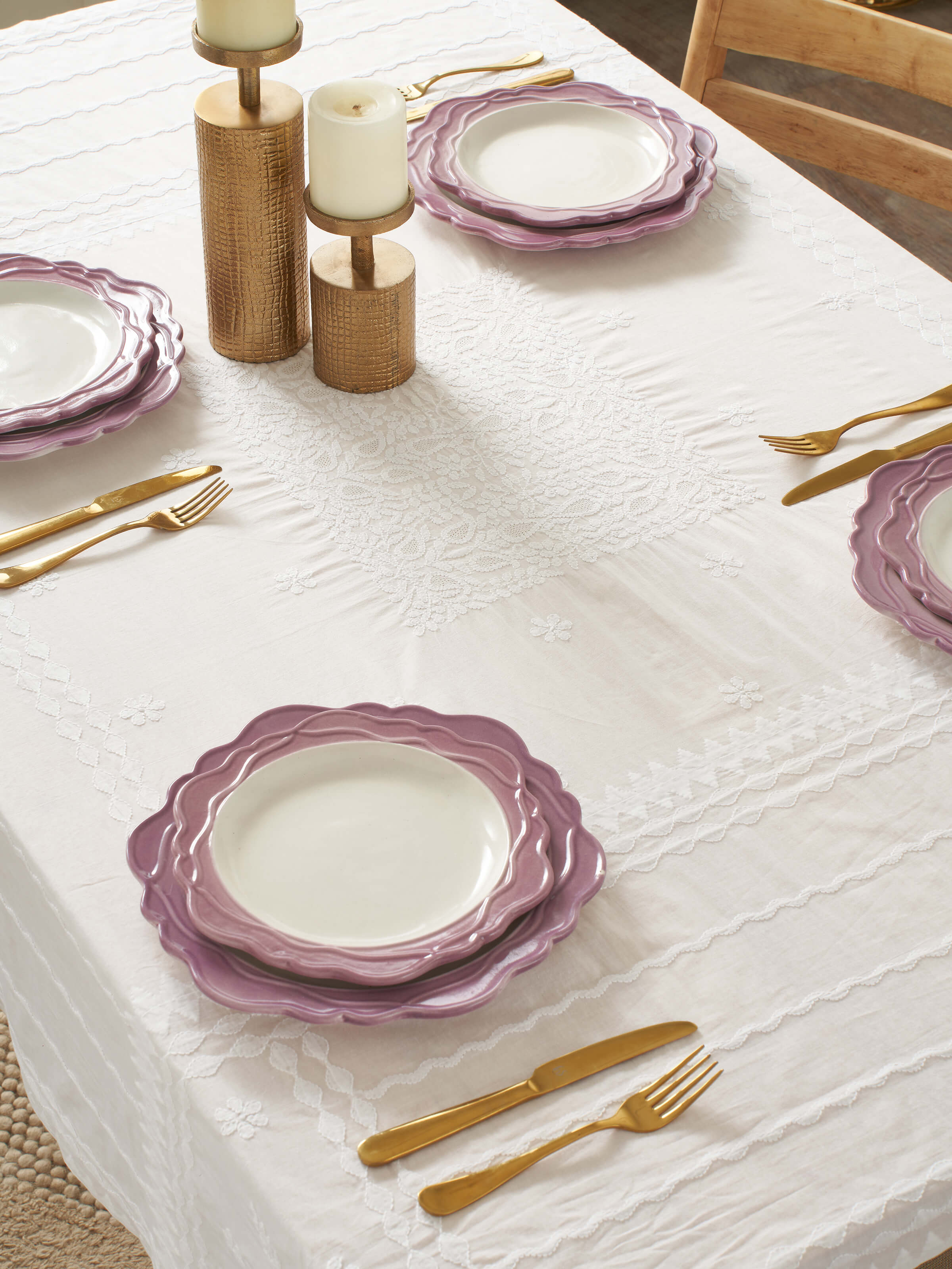 Close-up of studio pottery ceramic side plates white & pink set (4 pcs)