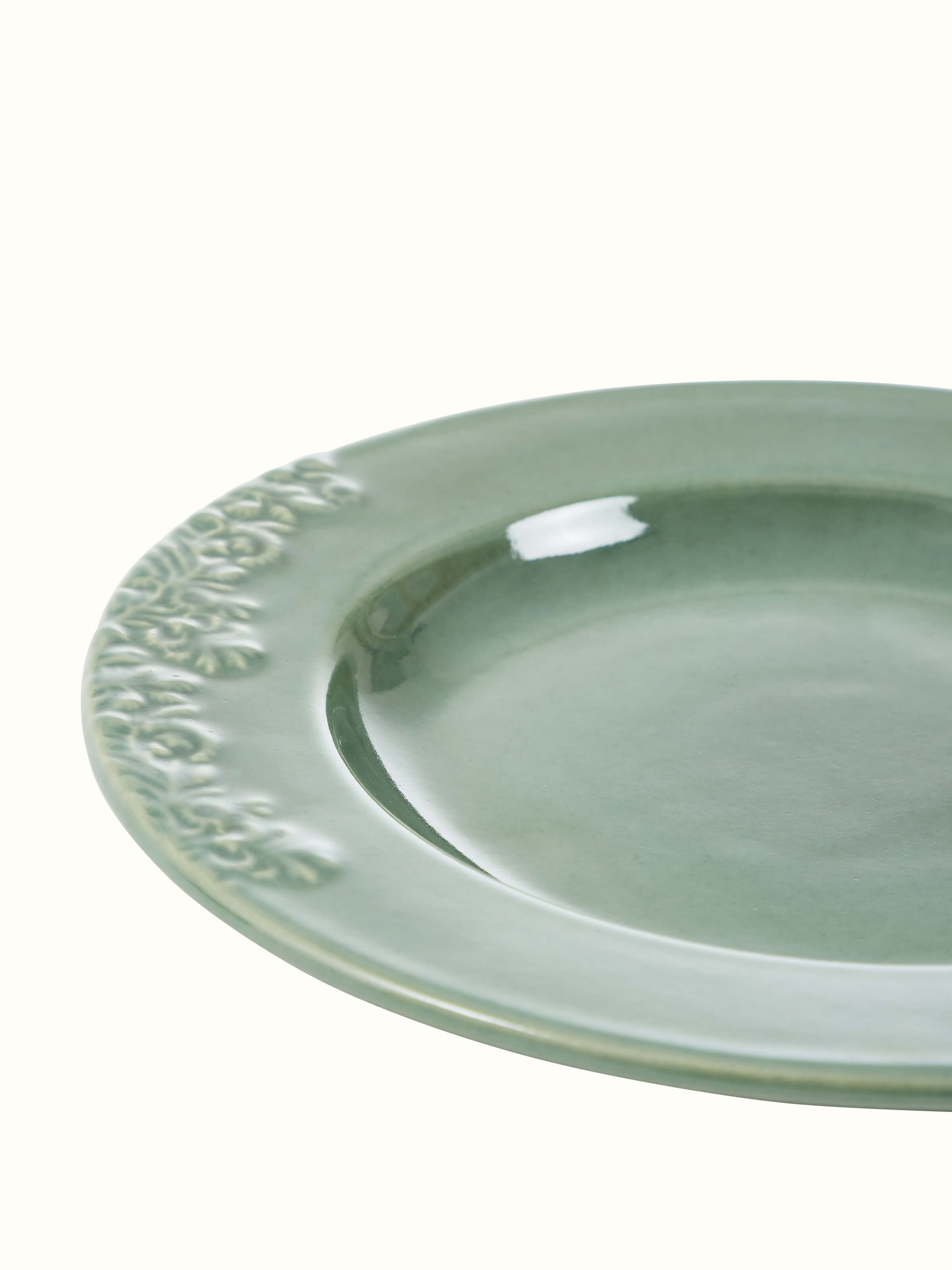 Artistic arrangement of Studio Pottery Ceramic Dinner Plates in green, emphasizing the cohesive design and color