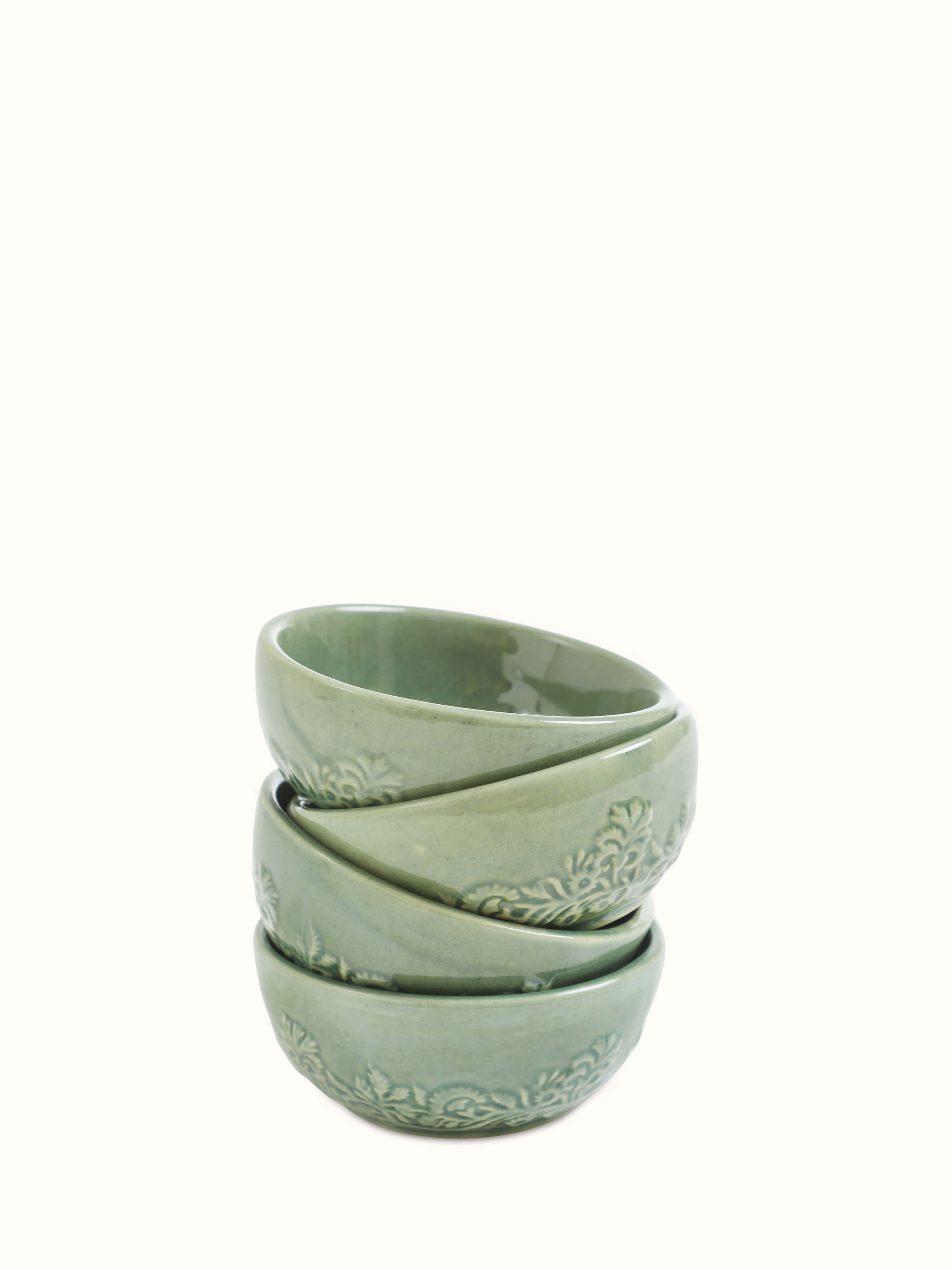 Close-up of Studio pottery ceramic dinner bowls green (4 pcs)
