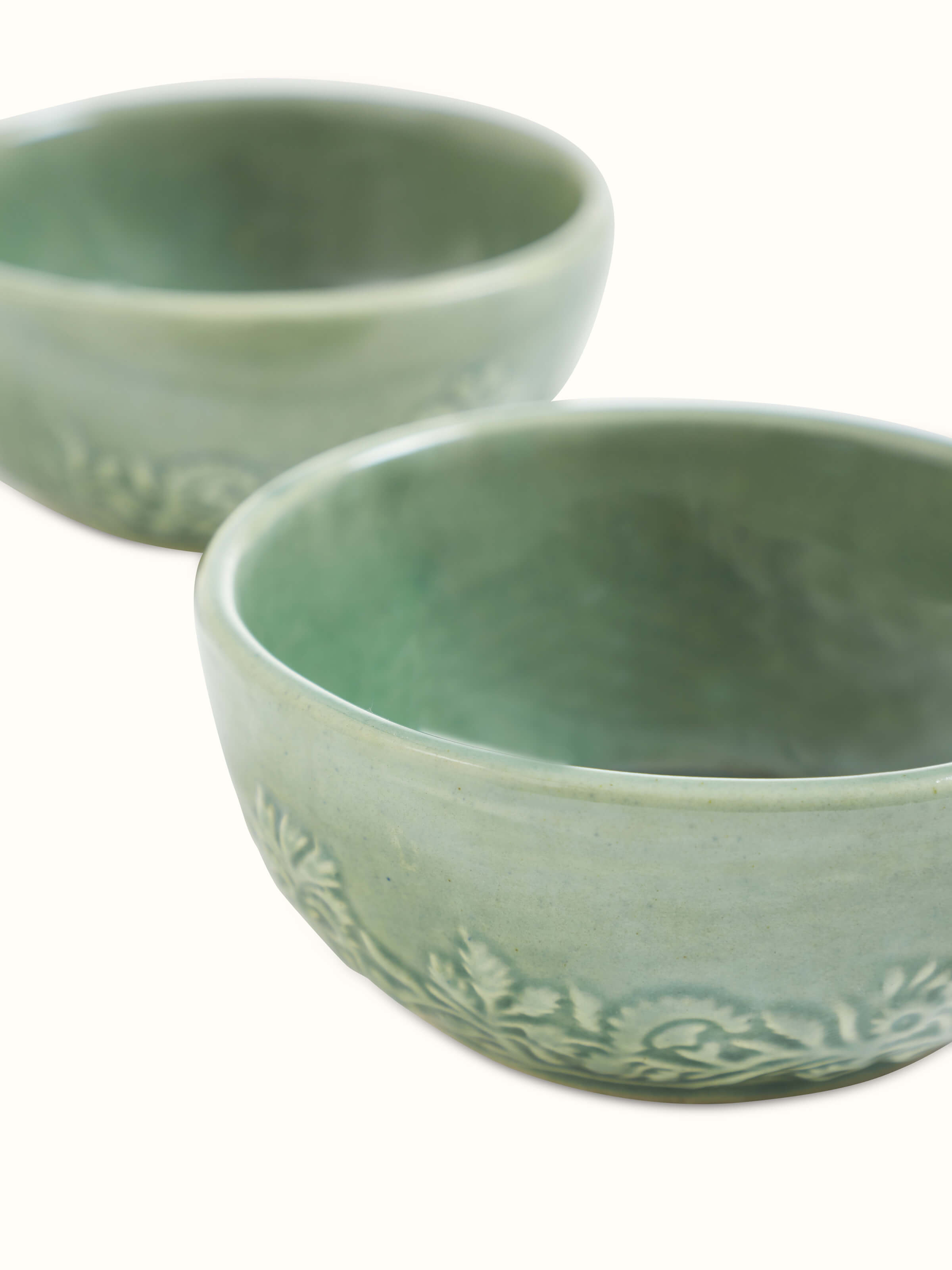 Angle view of Studio pottery ceramic dinner bowls green (4 pcs)