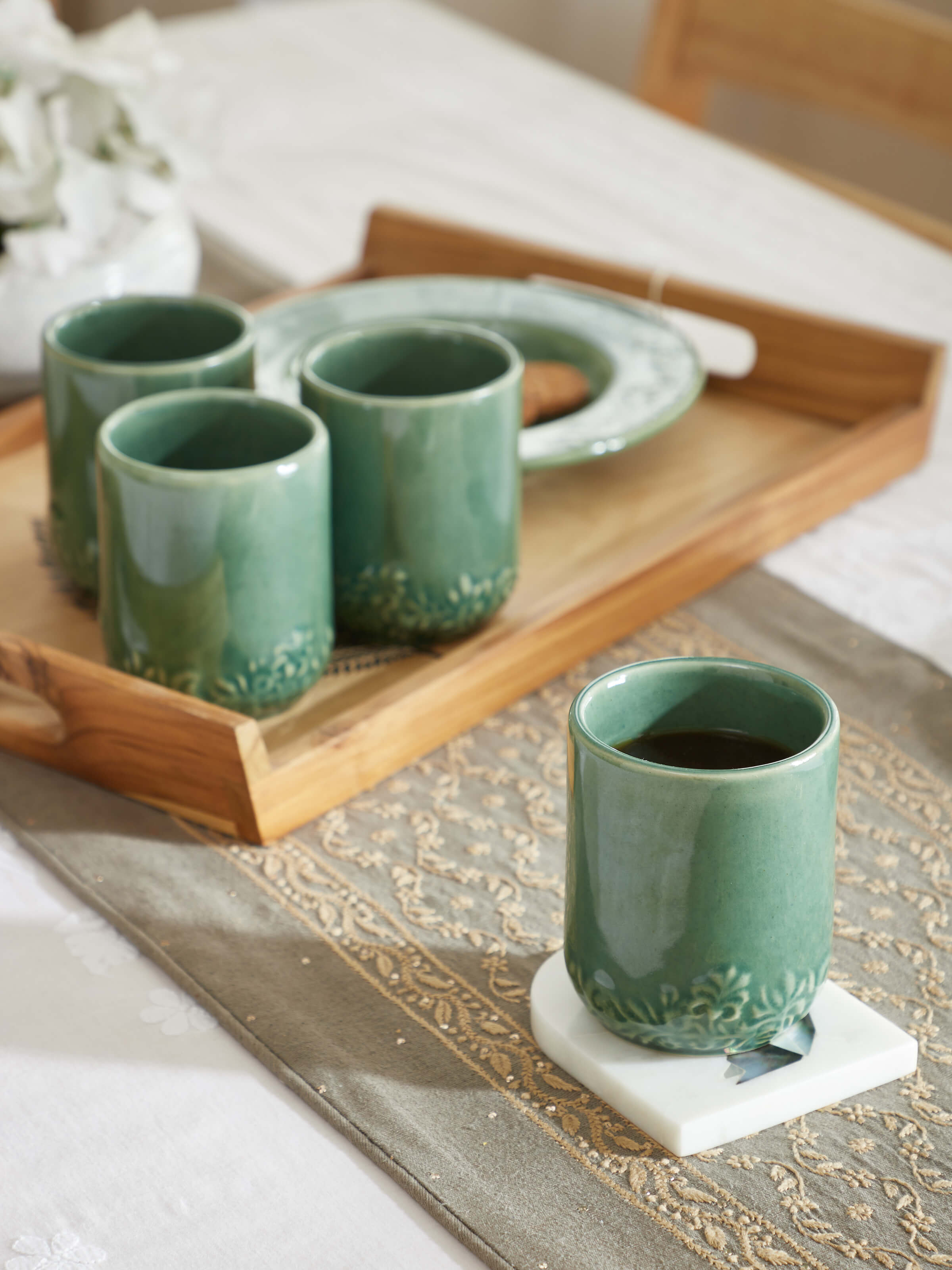 Top view of Studio Pottery Ceramic Water Tumblers in green highlighting the tumblers' rim and interior design.