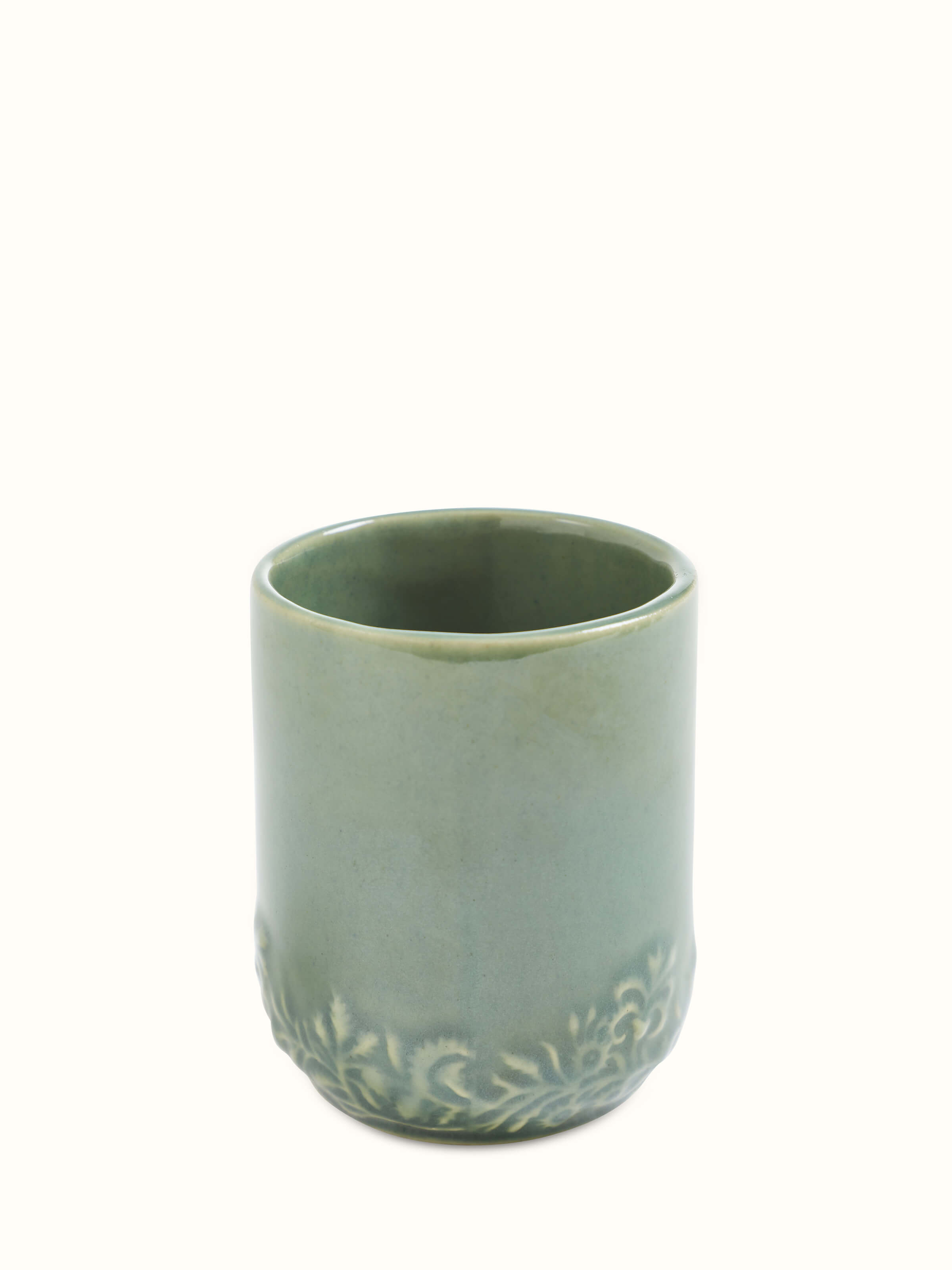 Angle view of Studio Pottery Ceramic Water Tumblers in green showcasing the tumblers' profile and texture.