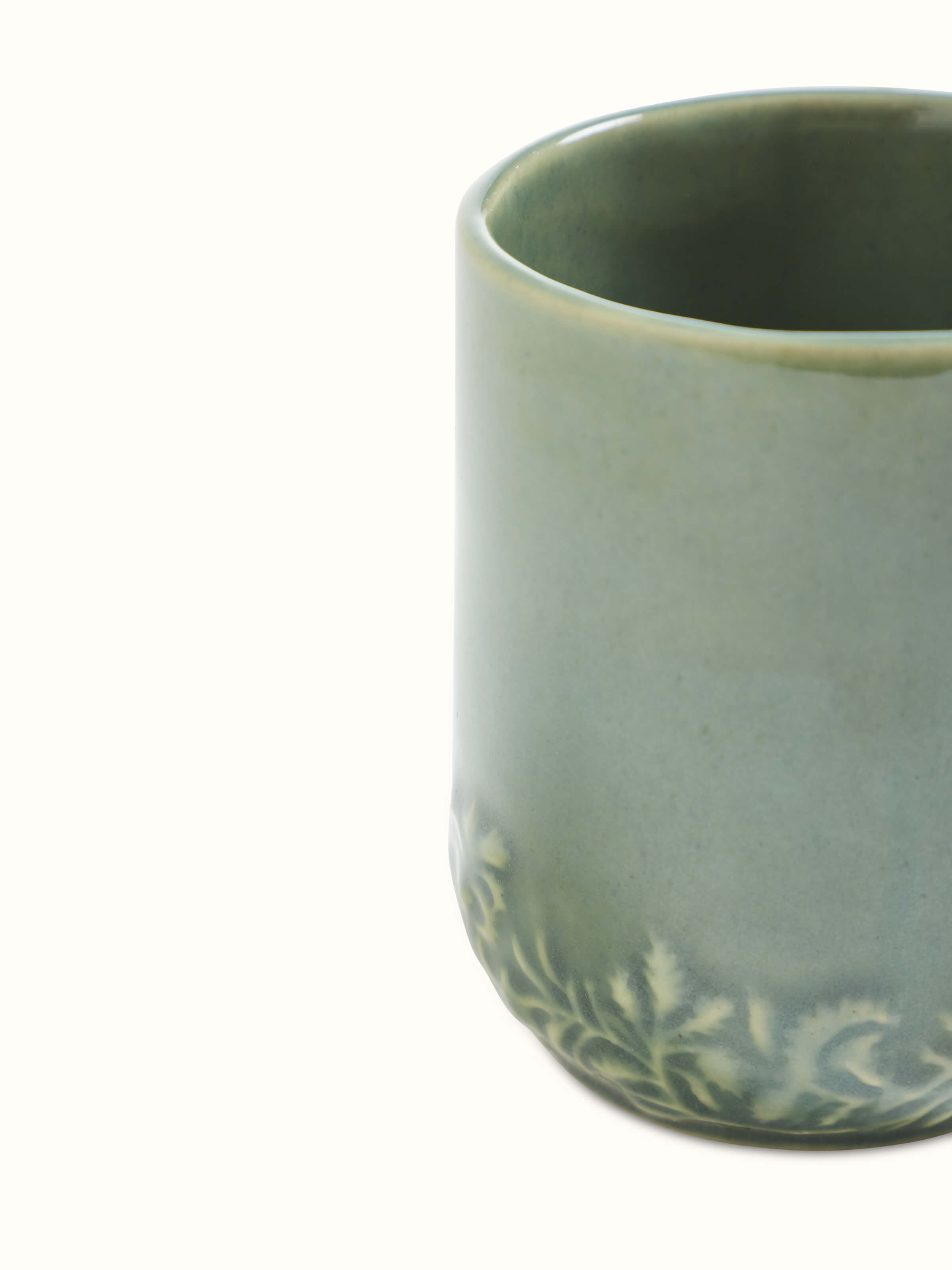 Close-up detail of Studio Pottery Ceramic Water Tumblers in green, emphasizing the ceramic texture and finish.