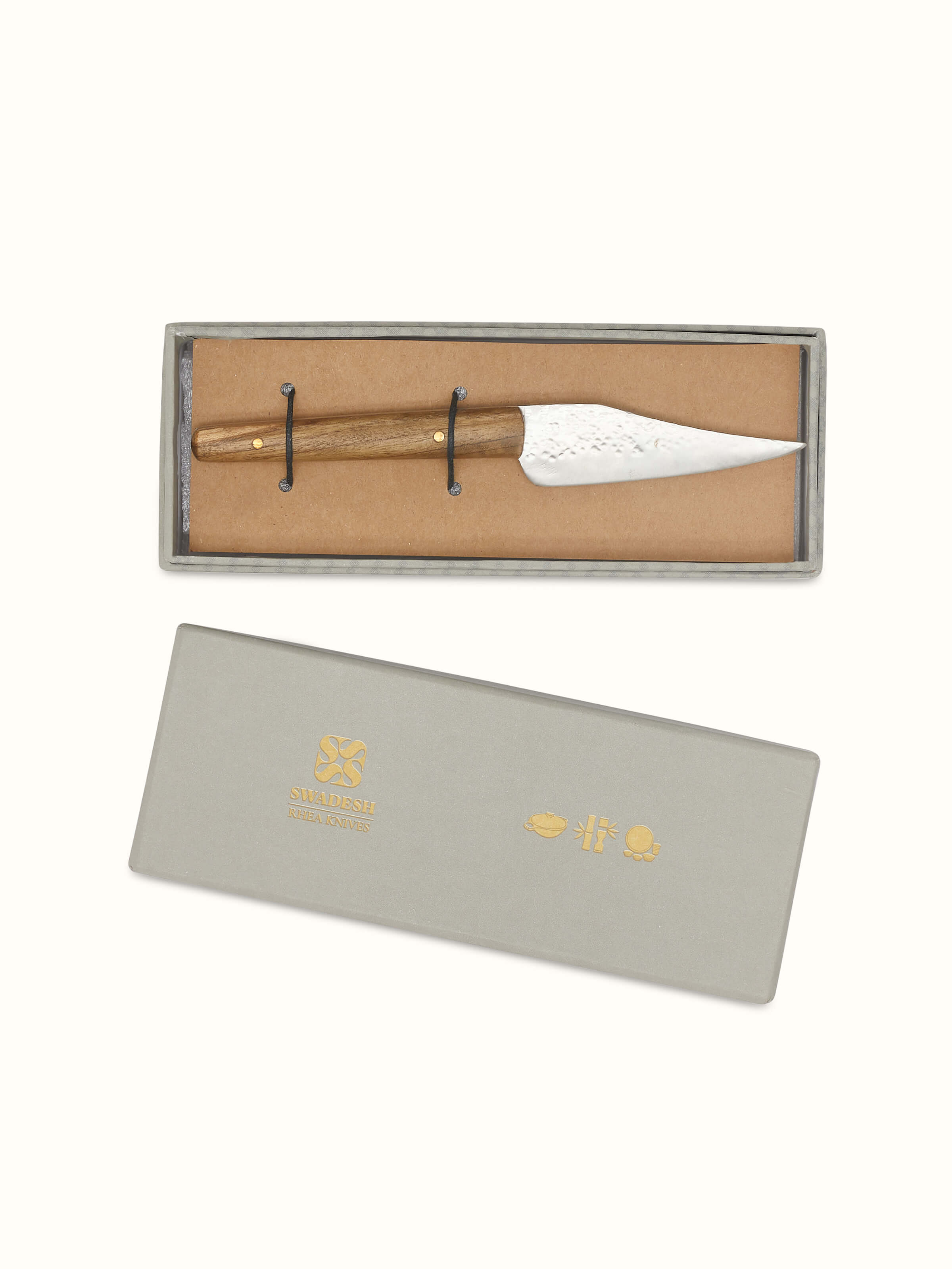 Front view of Reha stainless steel chef's knife showcasing its sharp blade and ergonomic handle.