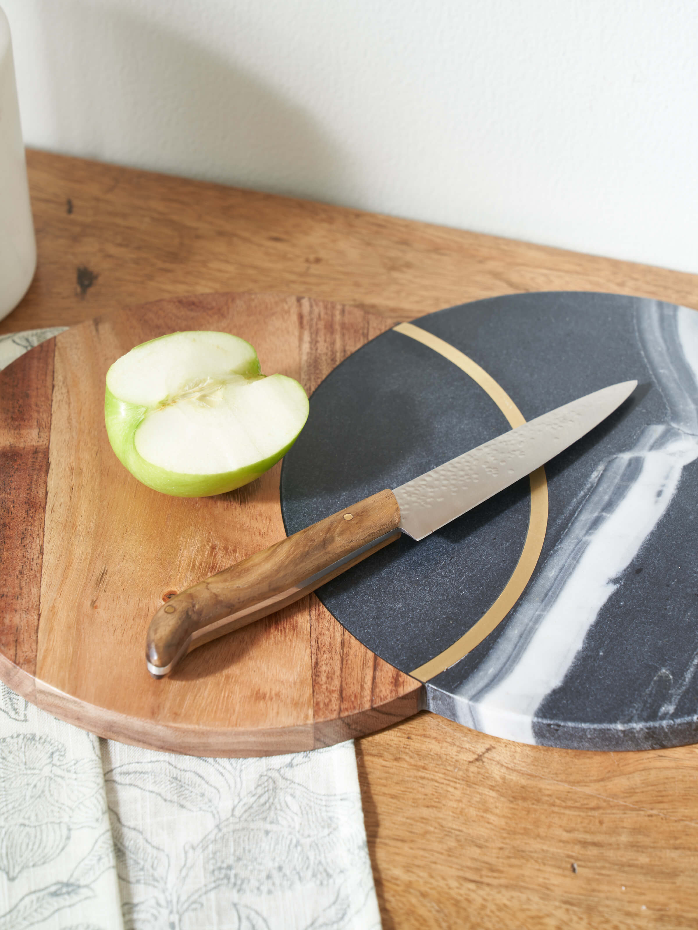 Side view of Reha stainless steel cleaver knife highlighting the precision edge and ergonomic handle