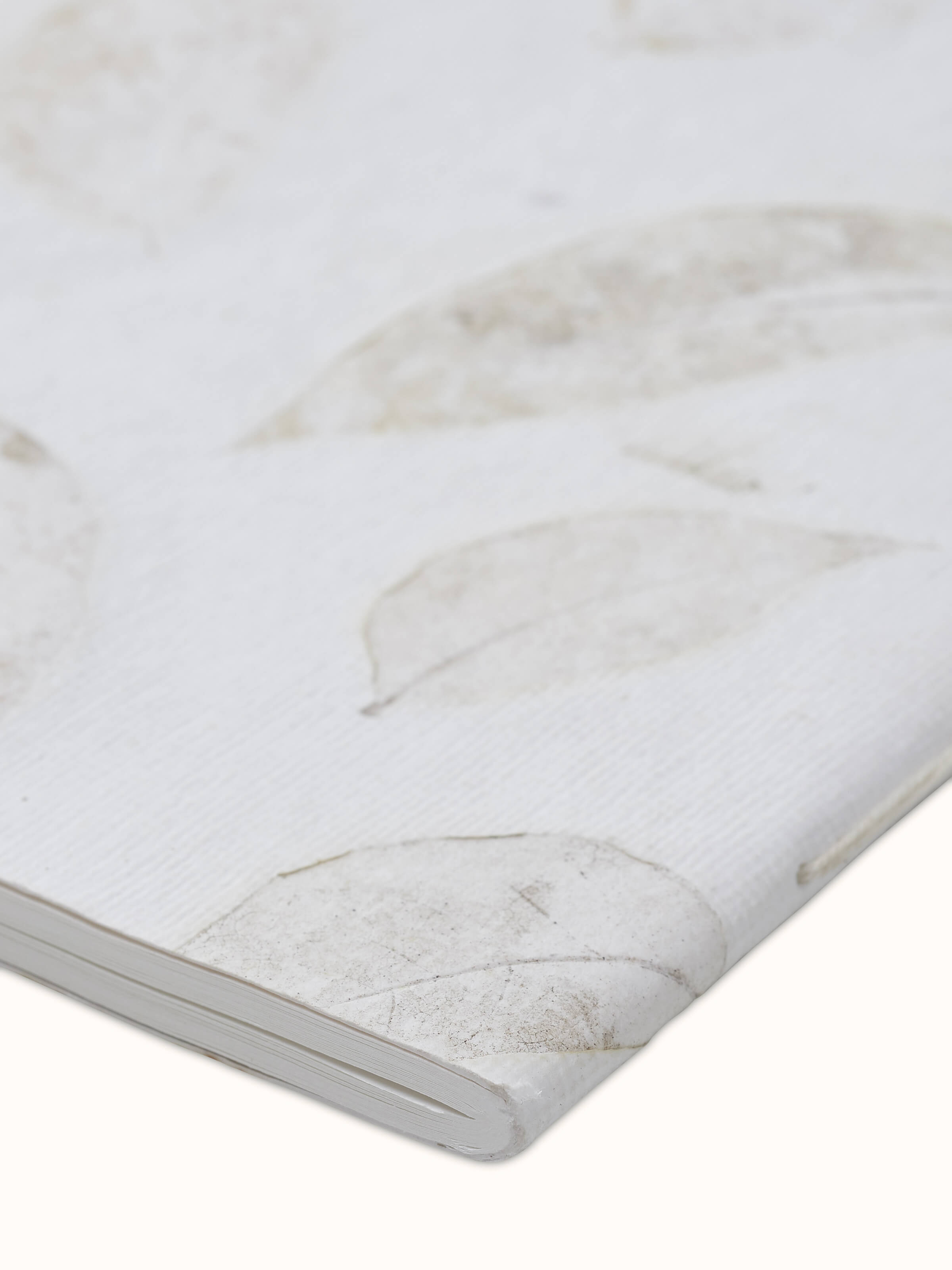 Close-up view of Auroville handmade paper notebook white (40 sheets)