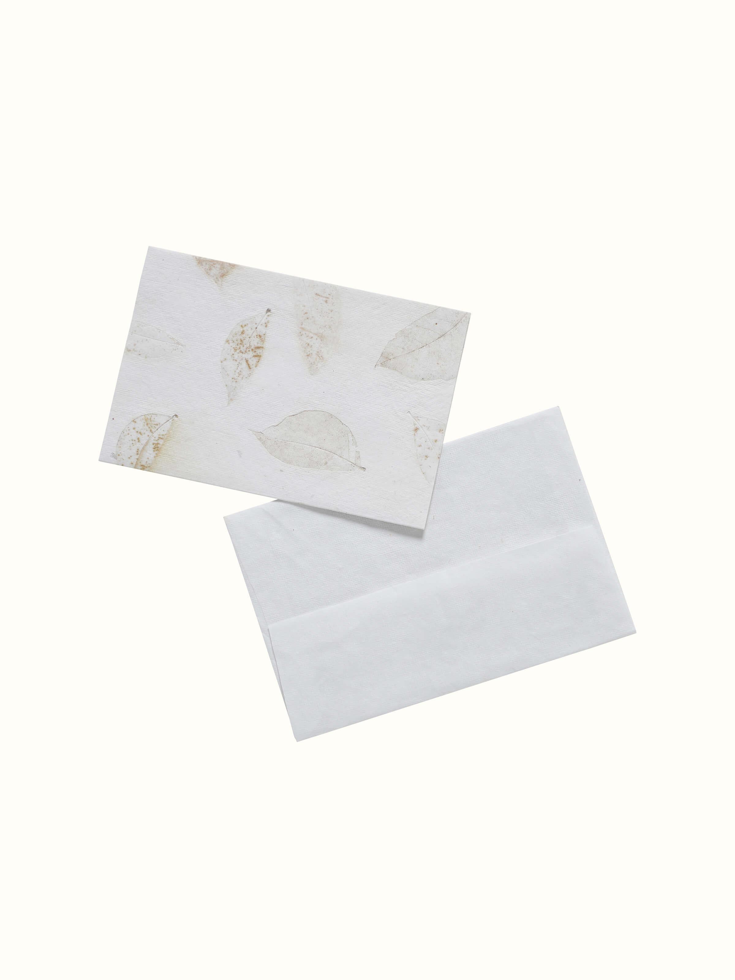 Angled view of Auroville Handmade Paper Money Envelopes in White (3 pcs) with detailed close-up.