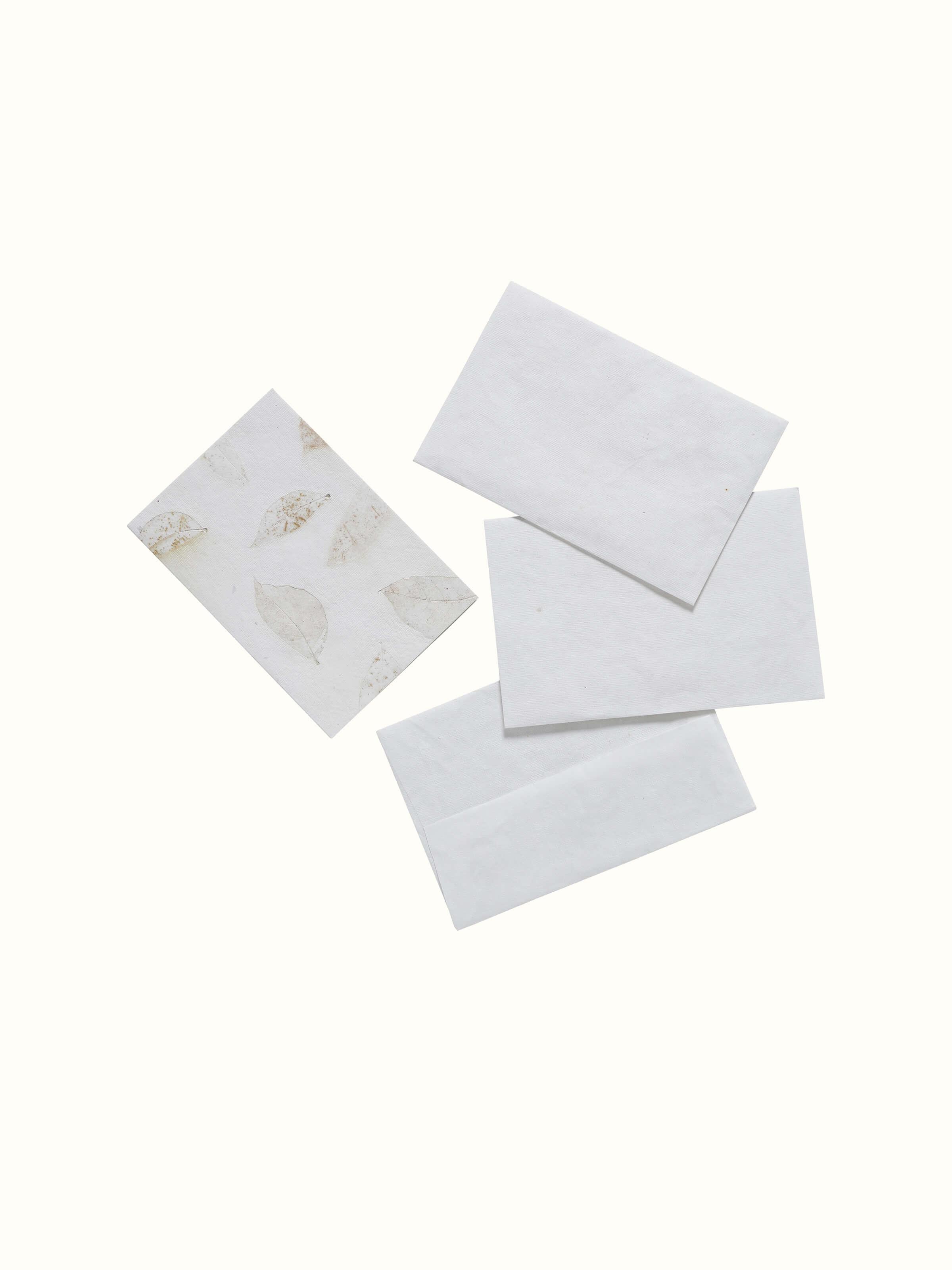 Close-up view of Auroville Handmade Paper Money Envelopes in White (3 pcs) showing texture and design.
