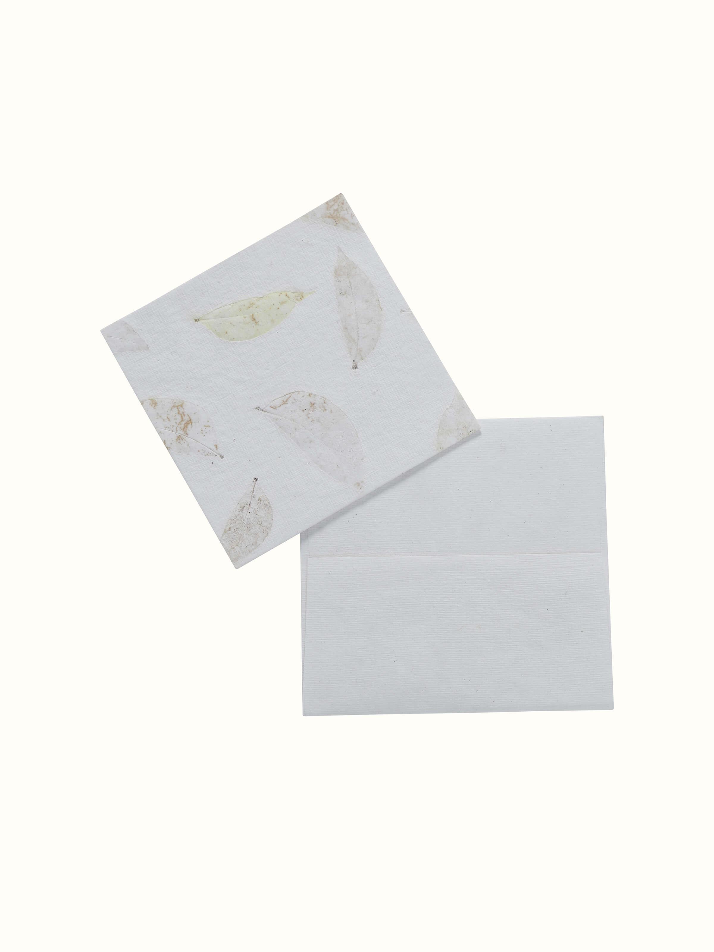Angled view of Auroville Handmade Paper Money Envelopes in White (3 pcs) with detailed close-up.