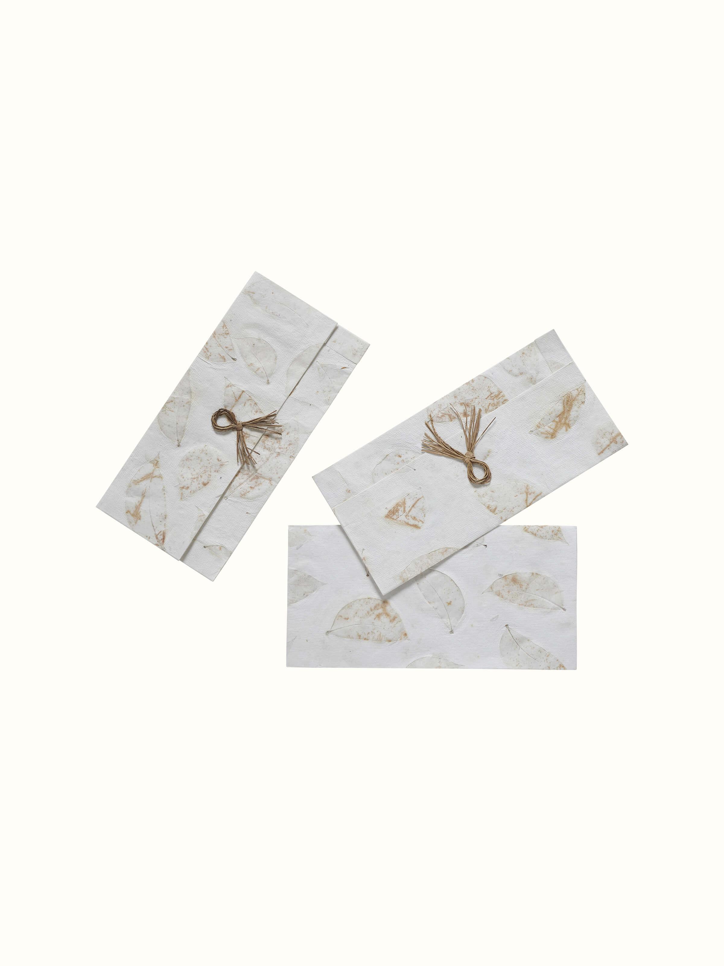 Close-up of Auroville handmade paper money envelopes in white color (3 pcs)