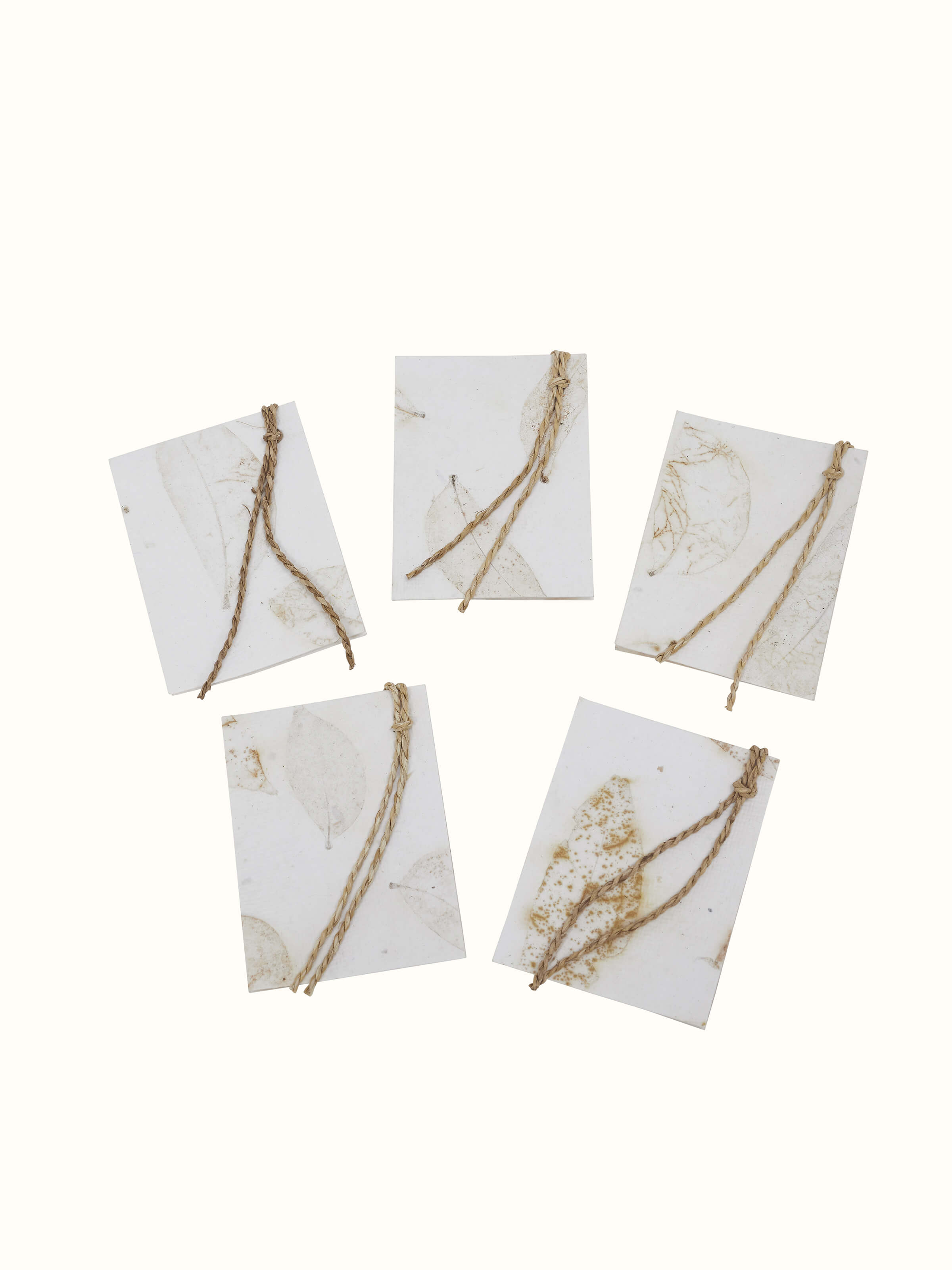 Detailed view of white handmade paper gift tags (set of 5) with sophisticated design.