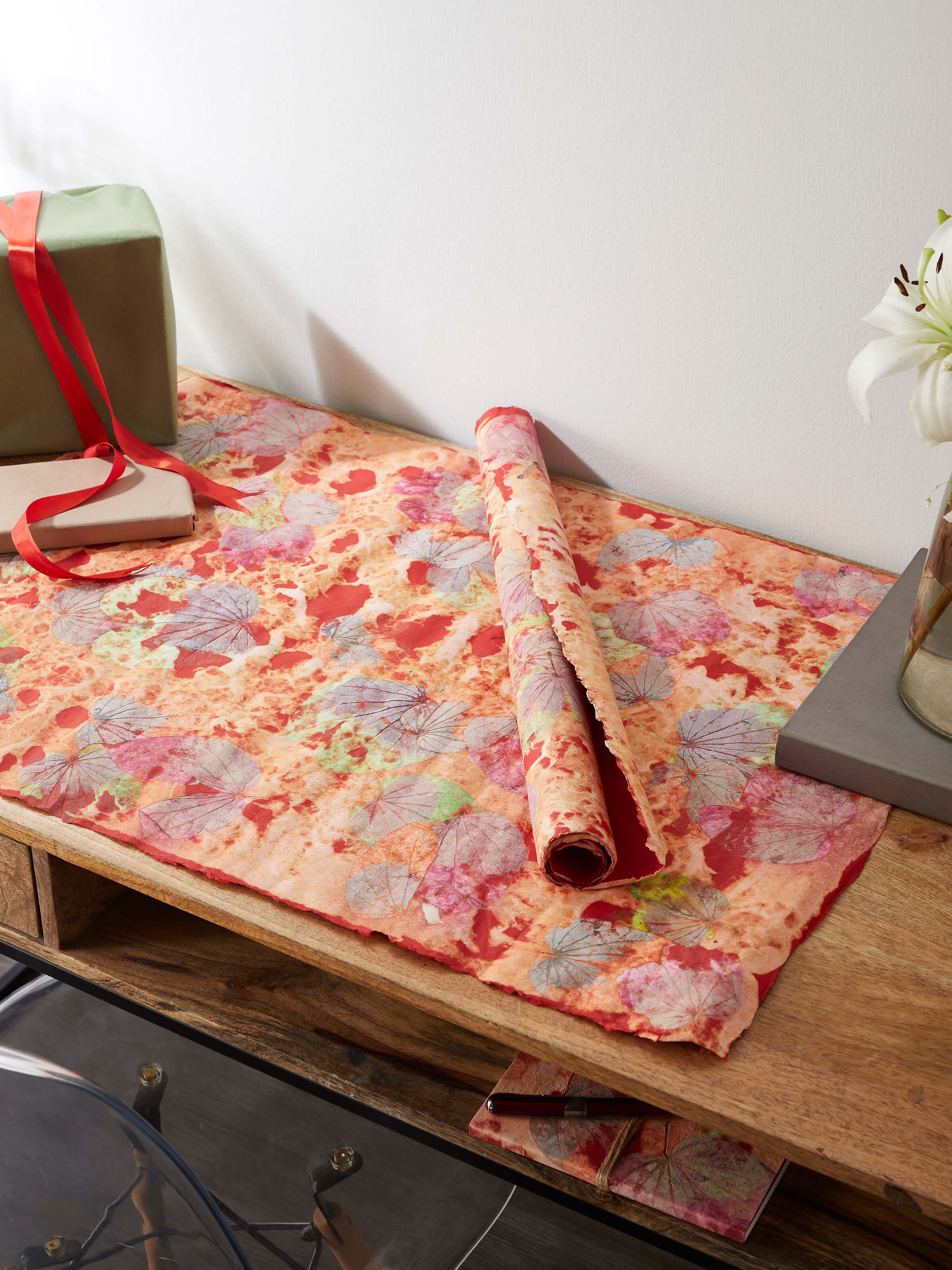 Side view of Auroville Handmade Paper Wrapping Sheets Red (2 pcs) highlighting smooth texture and premium quality