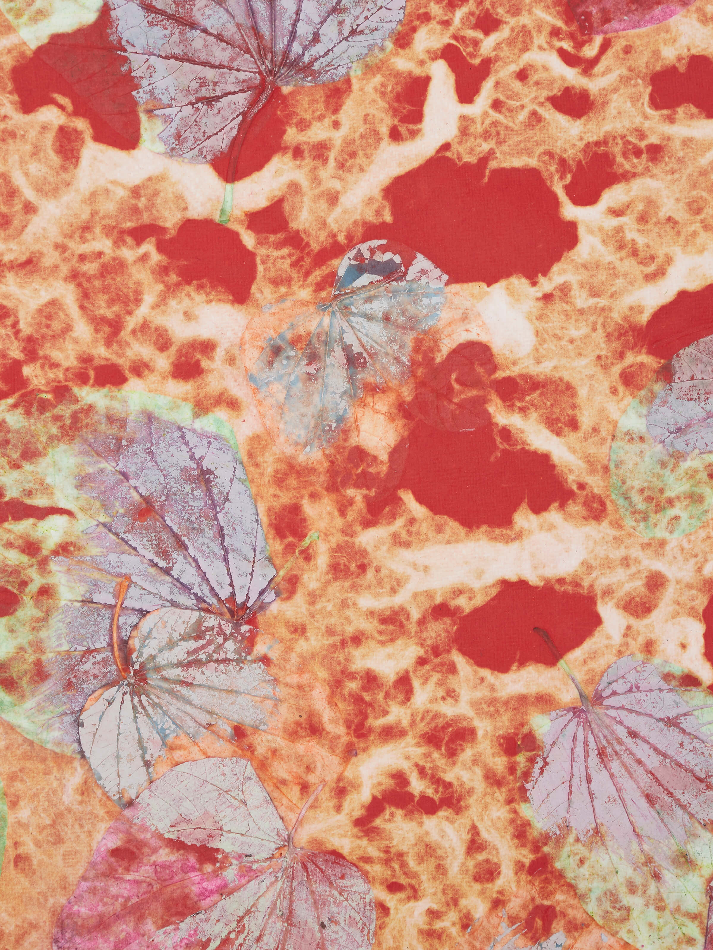 Close-up view of Auroville Handmade Paper Wrapping Sheets Red (2 pcs) illustrating its detailed print and natural fiber