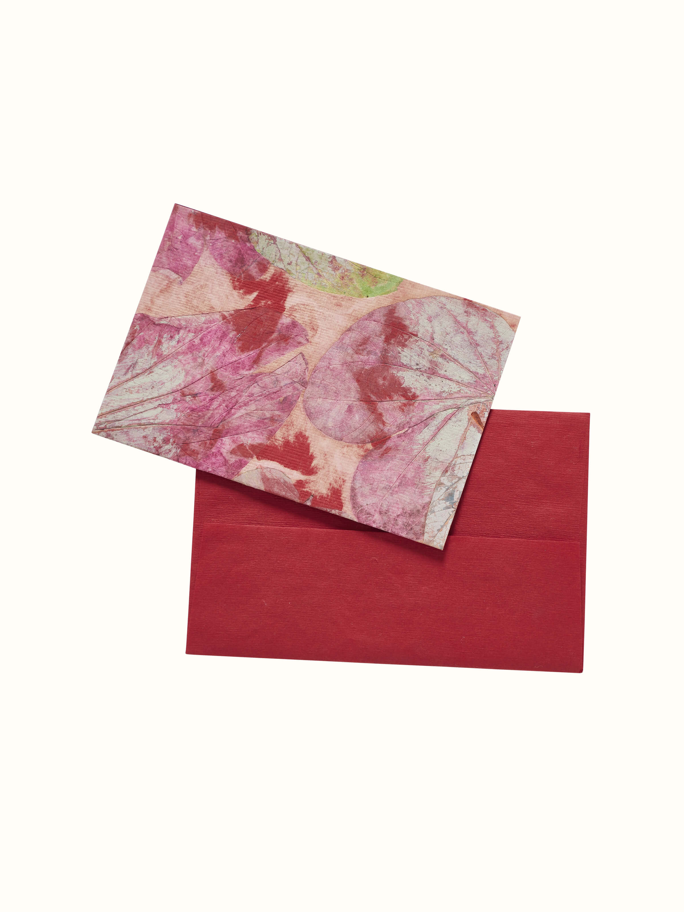 Front view of Auroville handmade paper money envelopes in red, showcasing their intricate design and craftsmanship