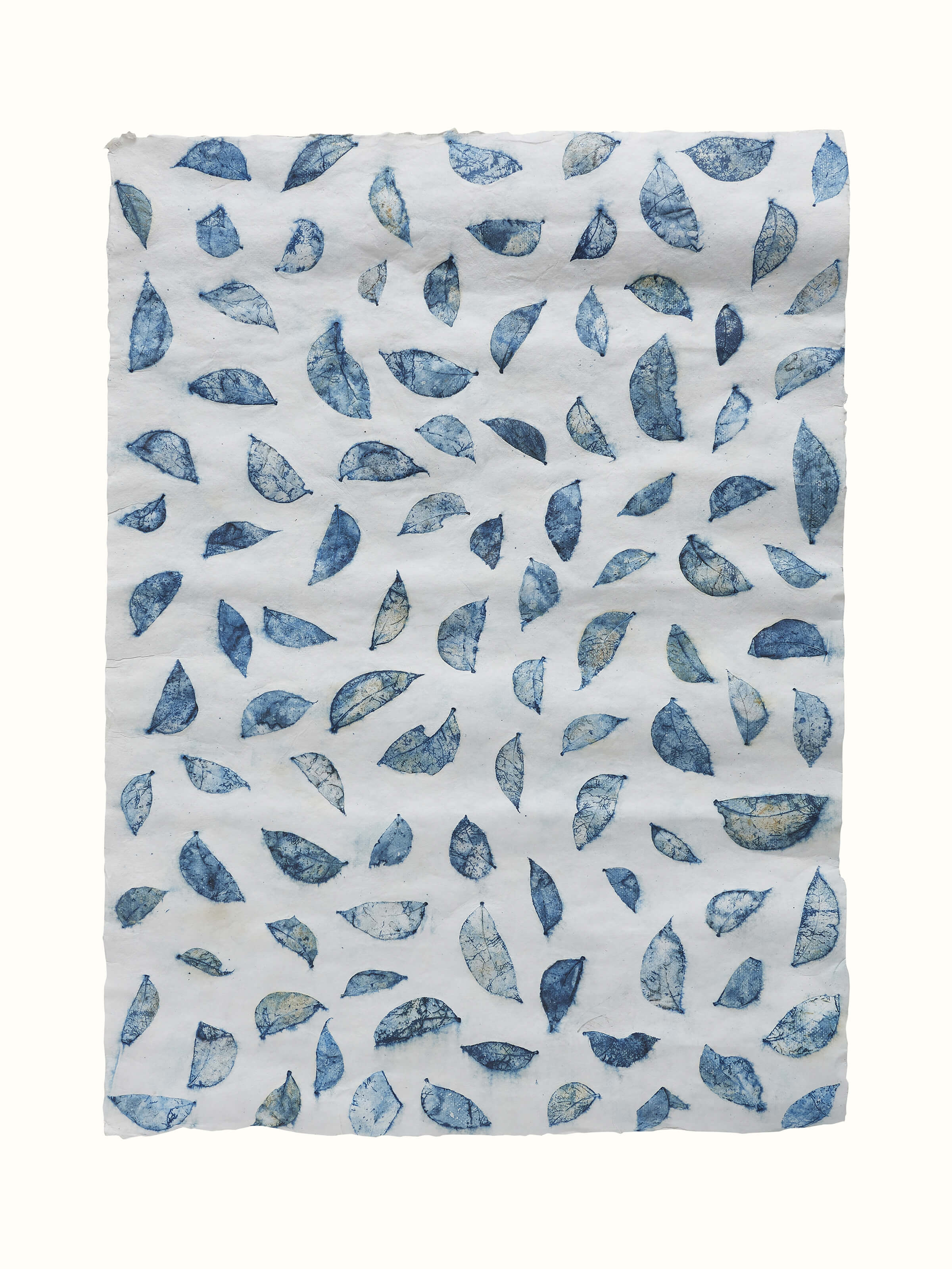 Front view of Auroville handmade paper wrapping sheets in blue, showing two sheets with a textured finish