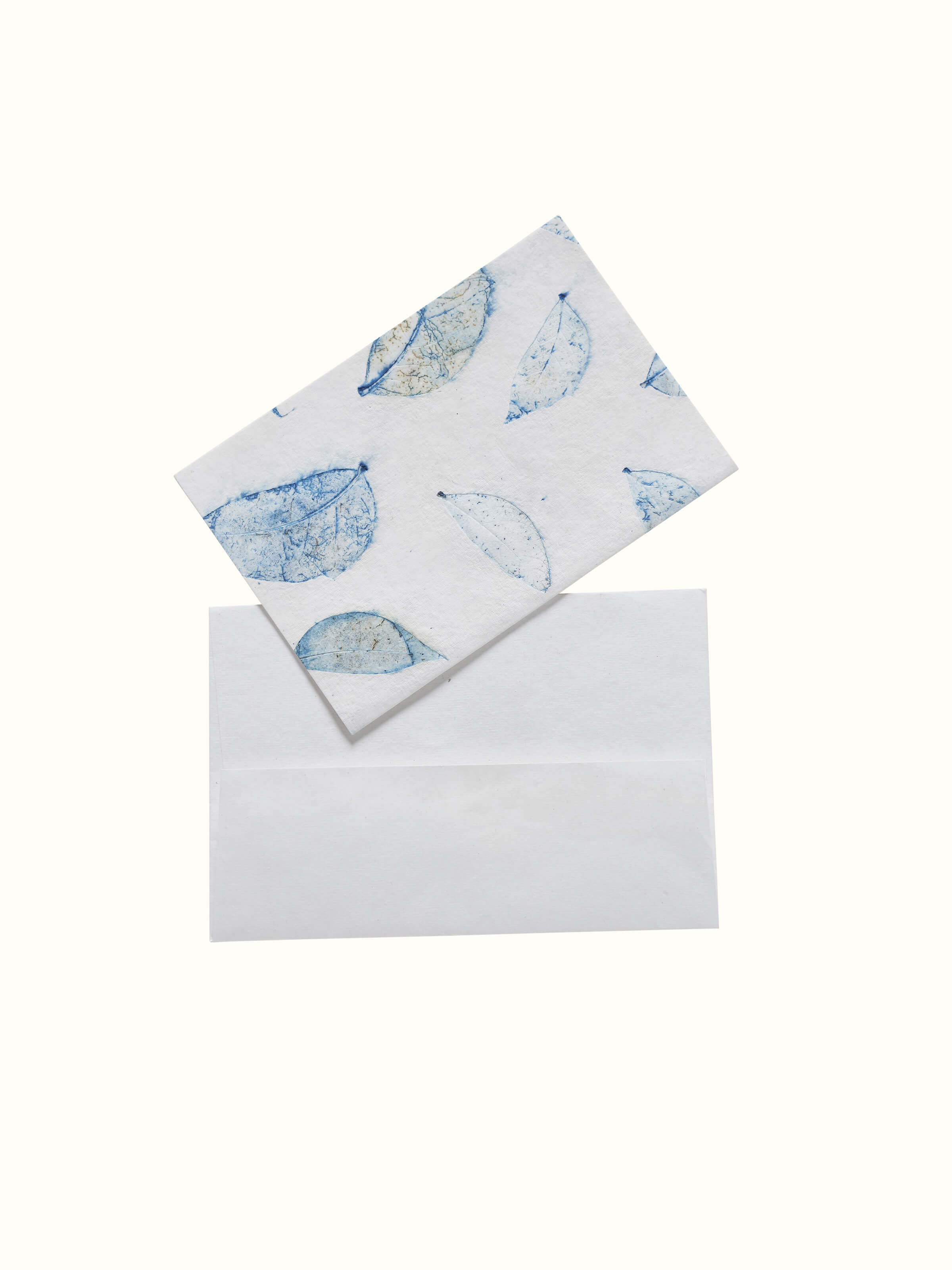 Detailed view of Auroville handmade paper money envelopes in white, showcasing the elegant texture and design.