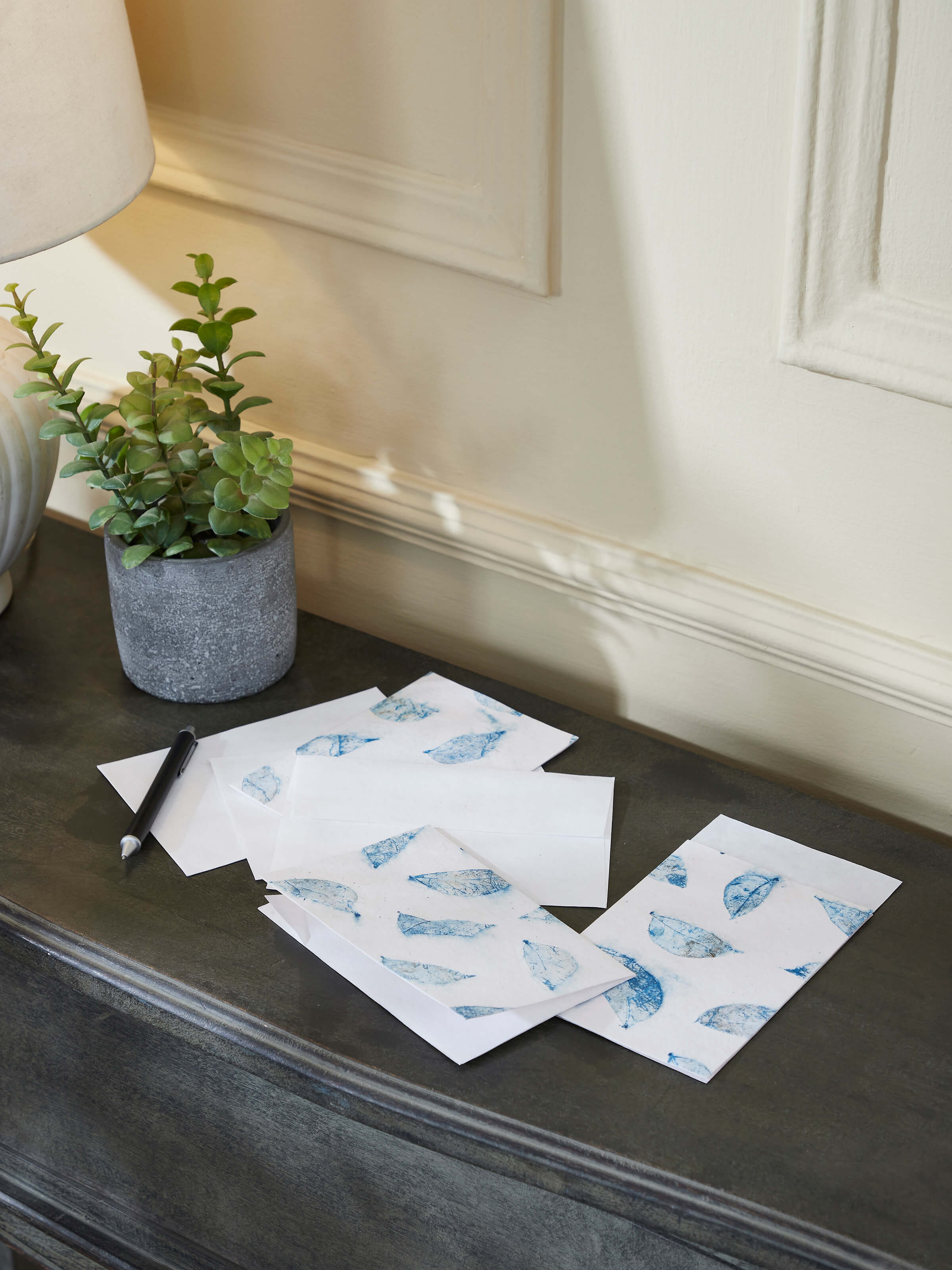 Front view of Auroville handmade paper money envelopes in white, highlighting their craftsmanship and quality.