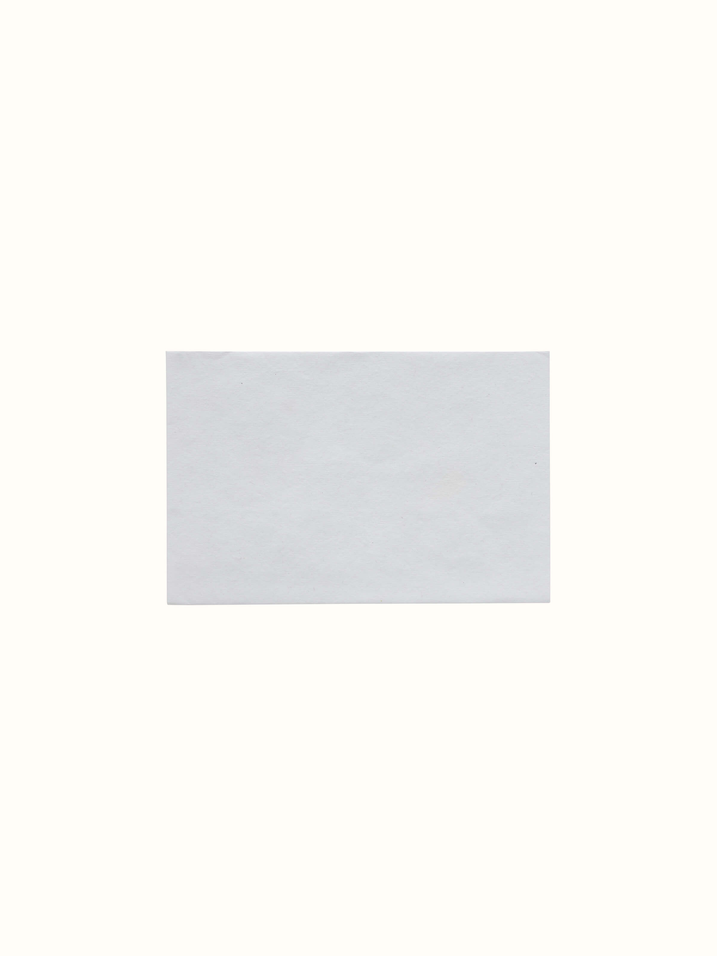 Auroville handmade paper money envelopes in white displayed in a group of three, emphasizing their elegant design and quality.