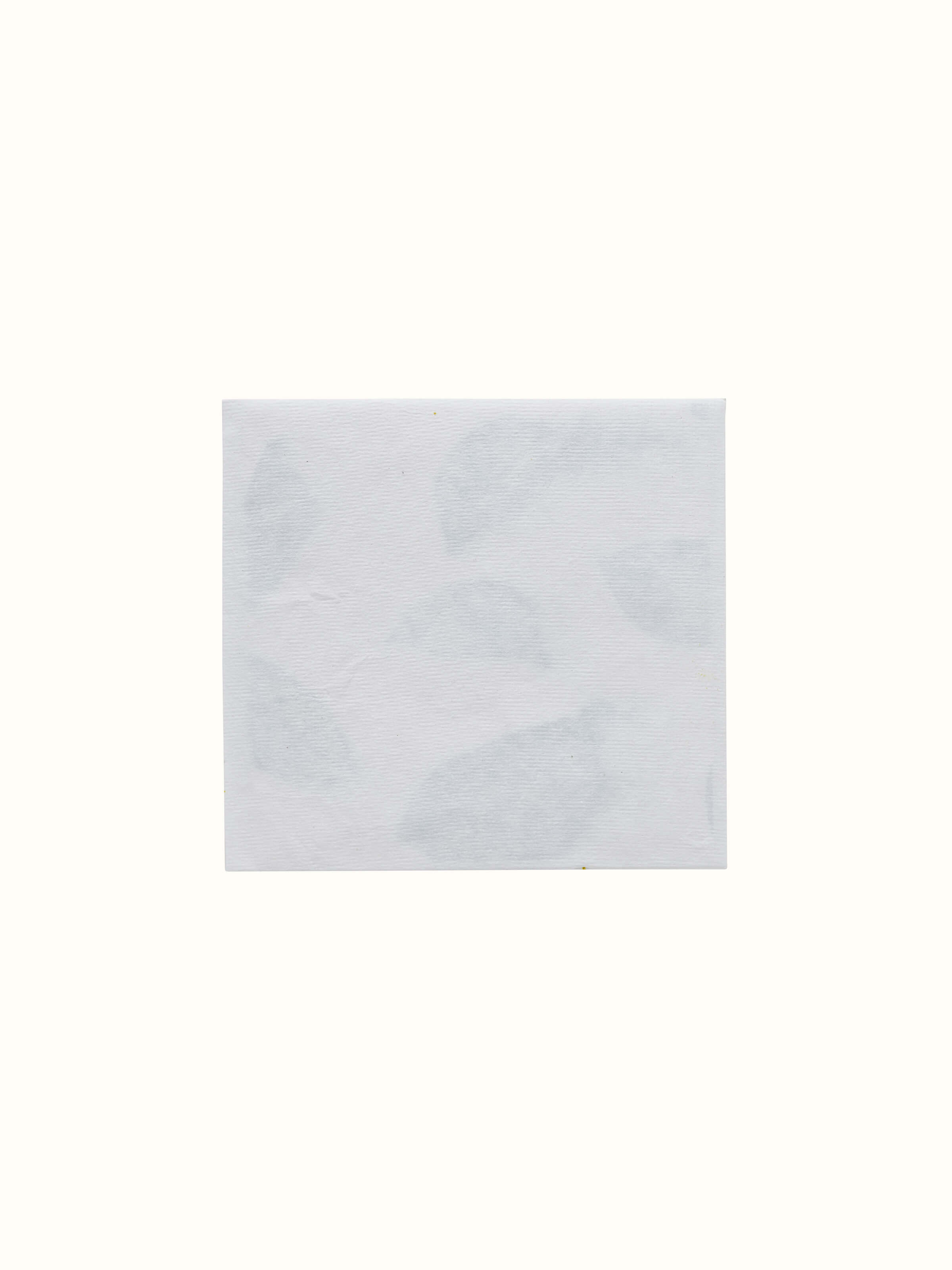 Artistic detail of Auroville handmade white paper money envelopes emphasizing the elegant design and craftsmanship